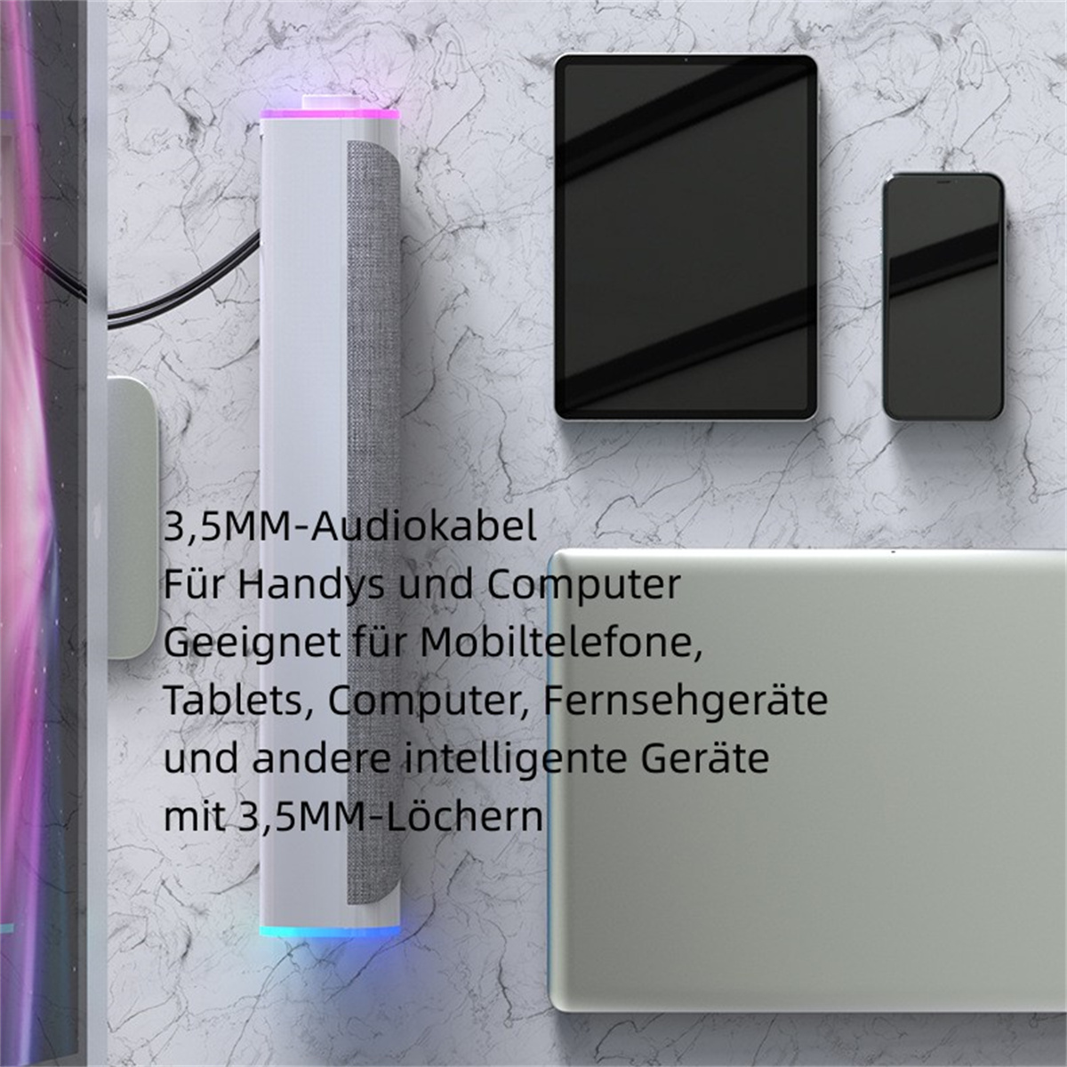 Un dispositivo blanco y gris con texto, una tableta y un teléfono en una pared.