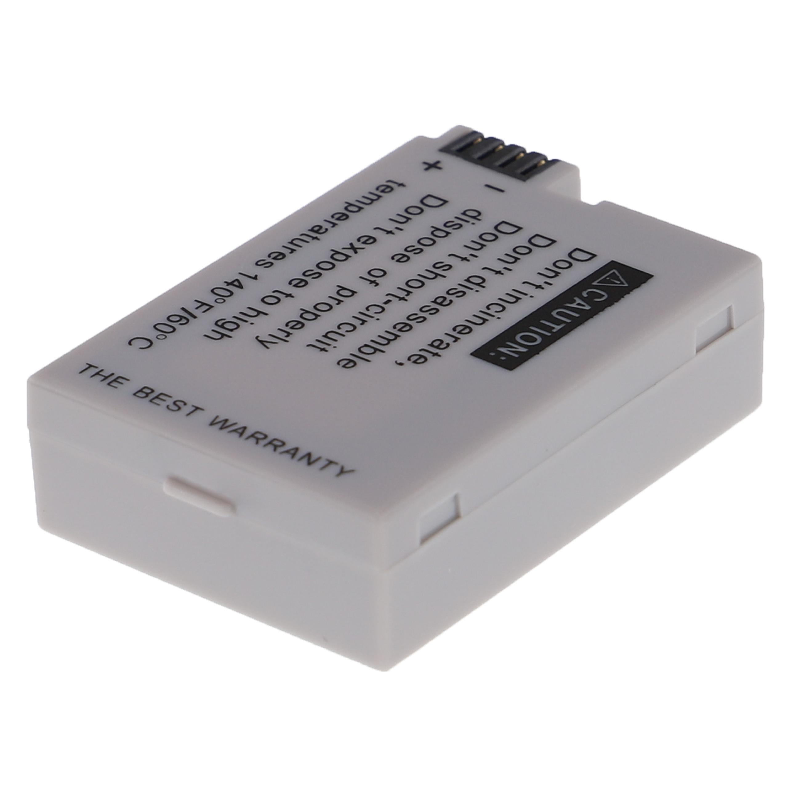 Eine kleine graue Batterie mit Warnhinweisen auf weißem Hintergrund.