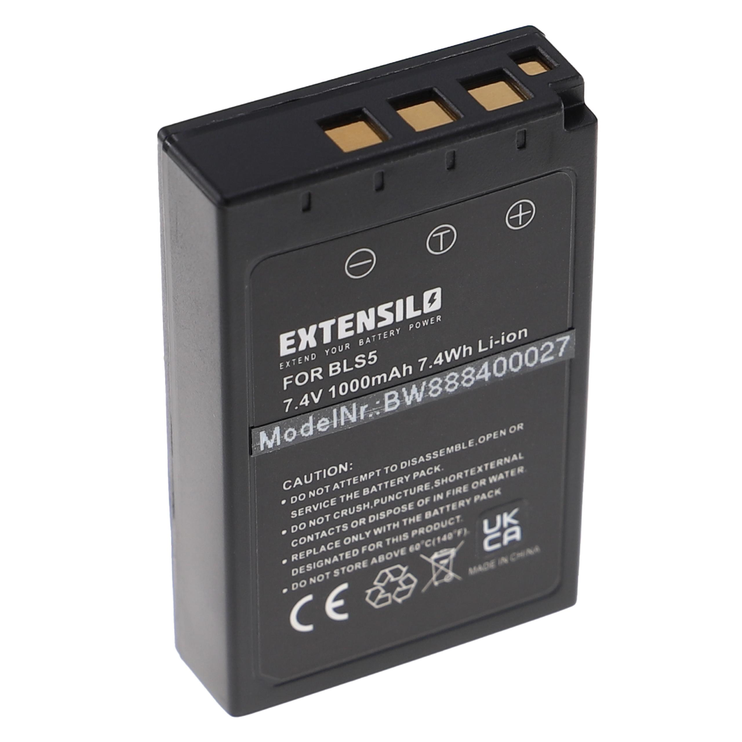 Schwarze Batterie mit Text und Symbolen, auf weißer Oberfläche, ein Produktpaket.