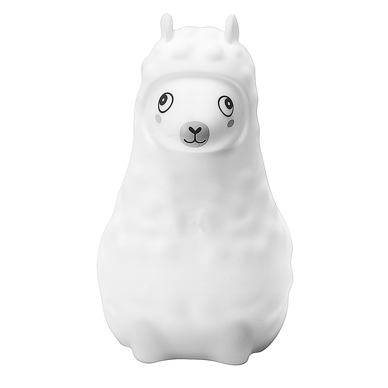 Luz de noche blanca con forma de llama. Tiene una cara sonriente y orejas pequeñas.