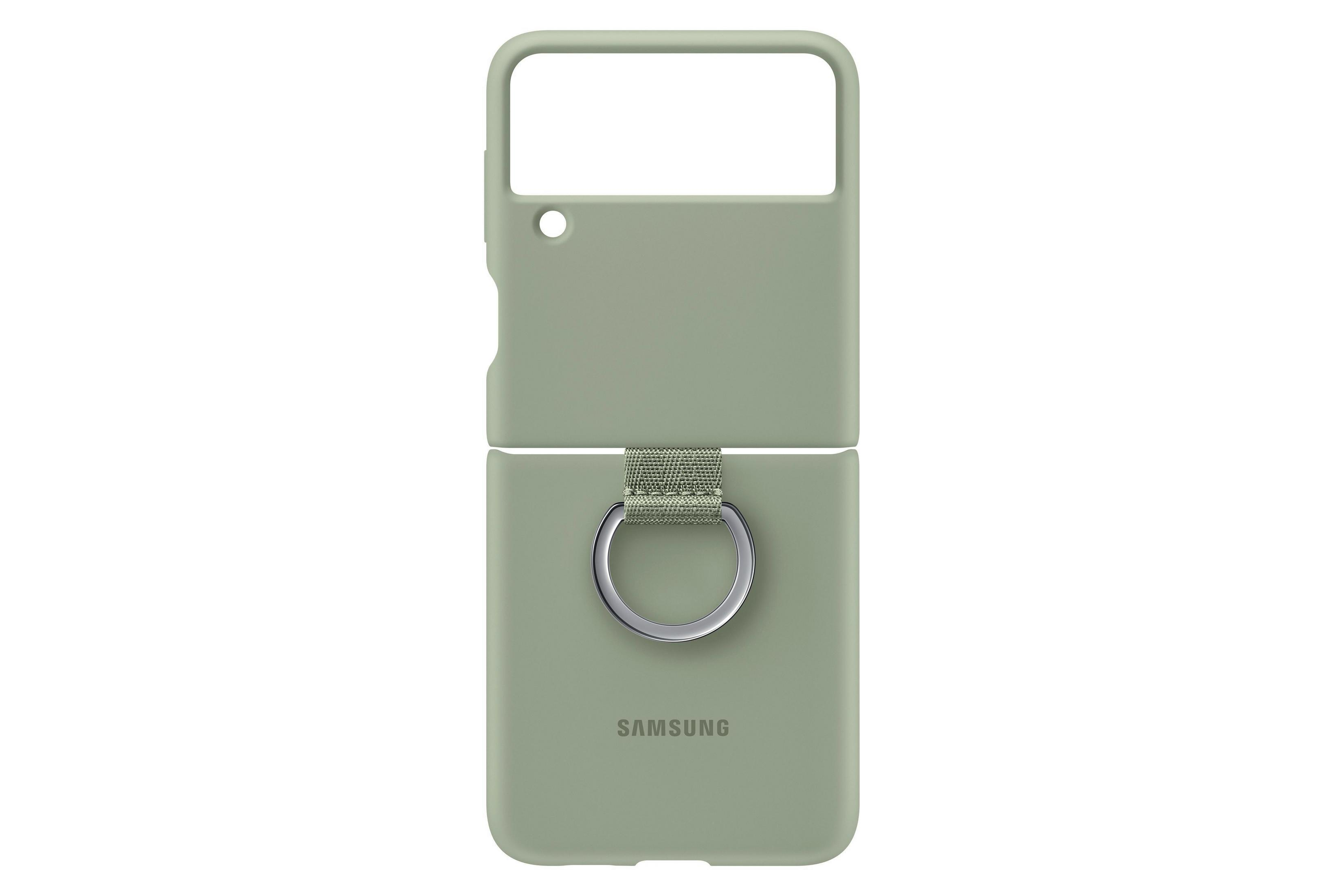 Eine grüne Handyhülle für Samsung Z Flip, geöffnet. Silberner Ring und grüner Riemen. Weißer Hintergrund.