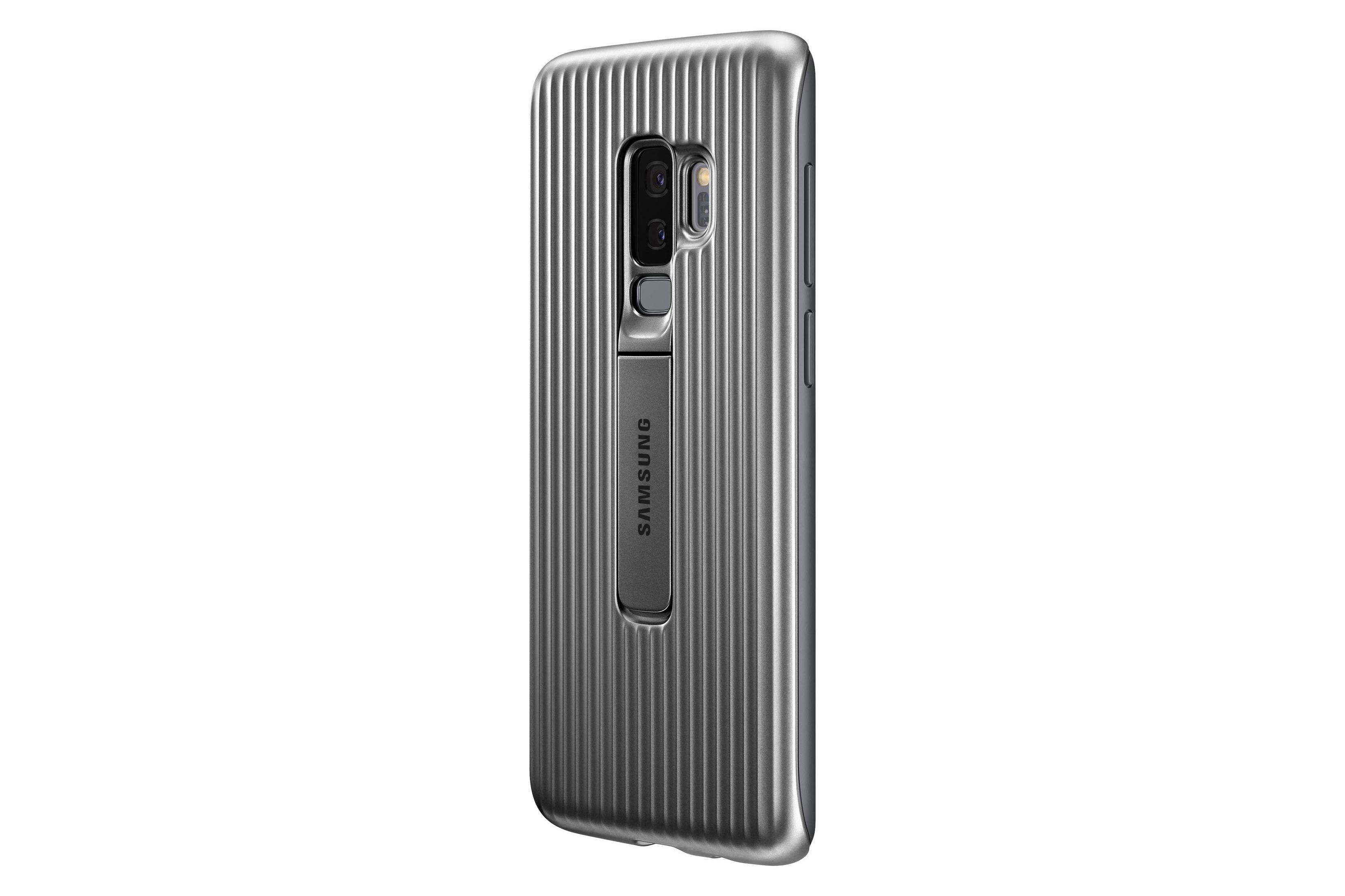 Eine silberne Handyhülle mit vertikalen Linien und Samsung-Logo, mit Ständer.