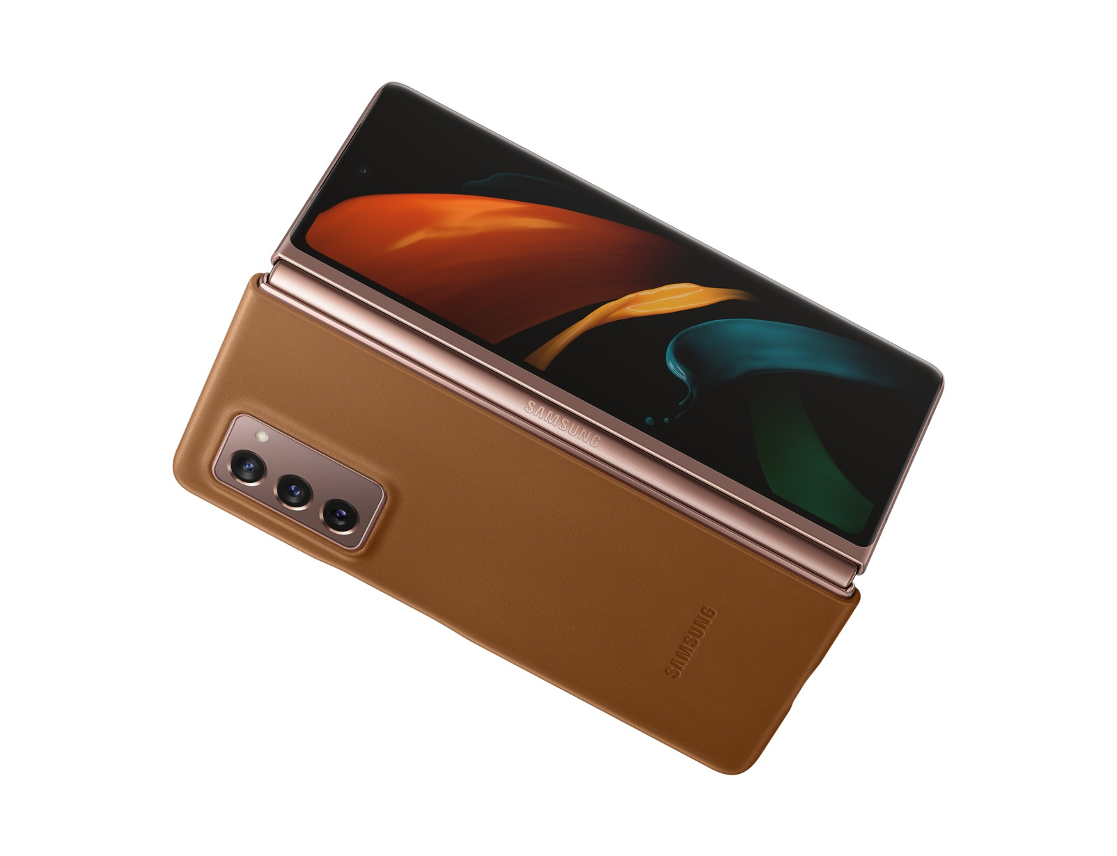 Un téléphone marron plié avec une charnière dorée sur fond blanc, vue de dessus.