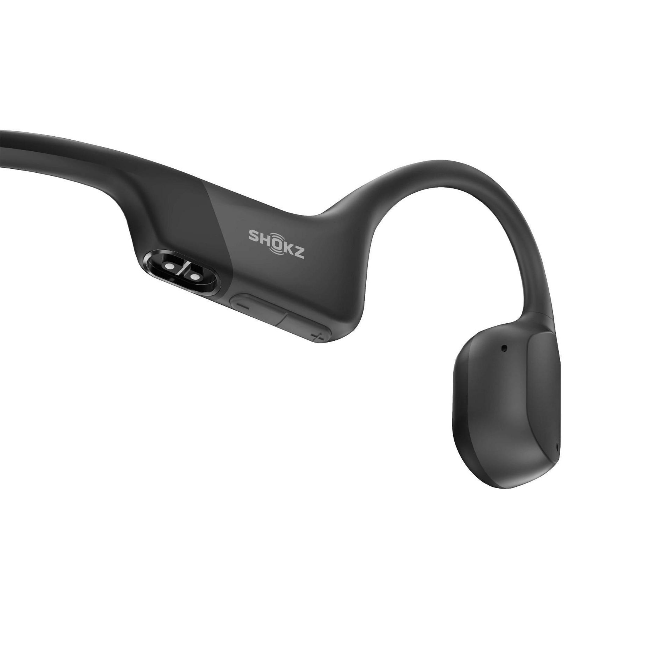 Schwarze, gebogene Shokz-Knochenschallkopfhörer, Nahaufnahme auf Weiß.