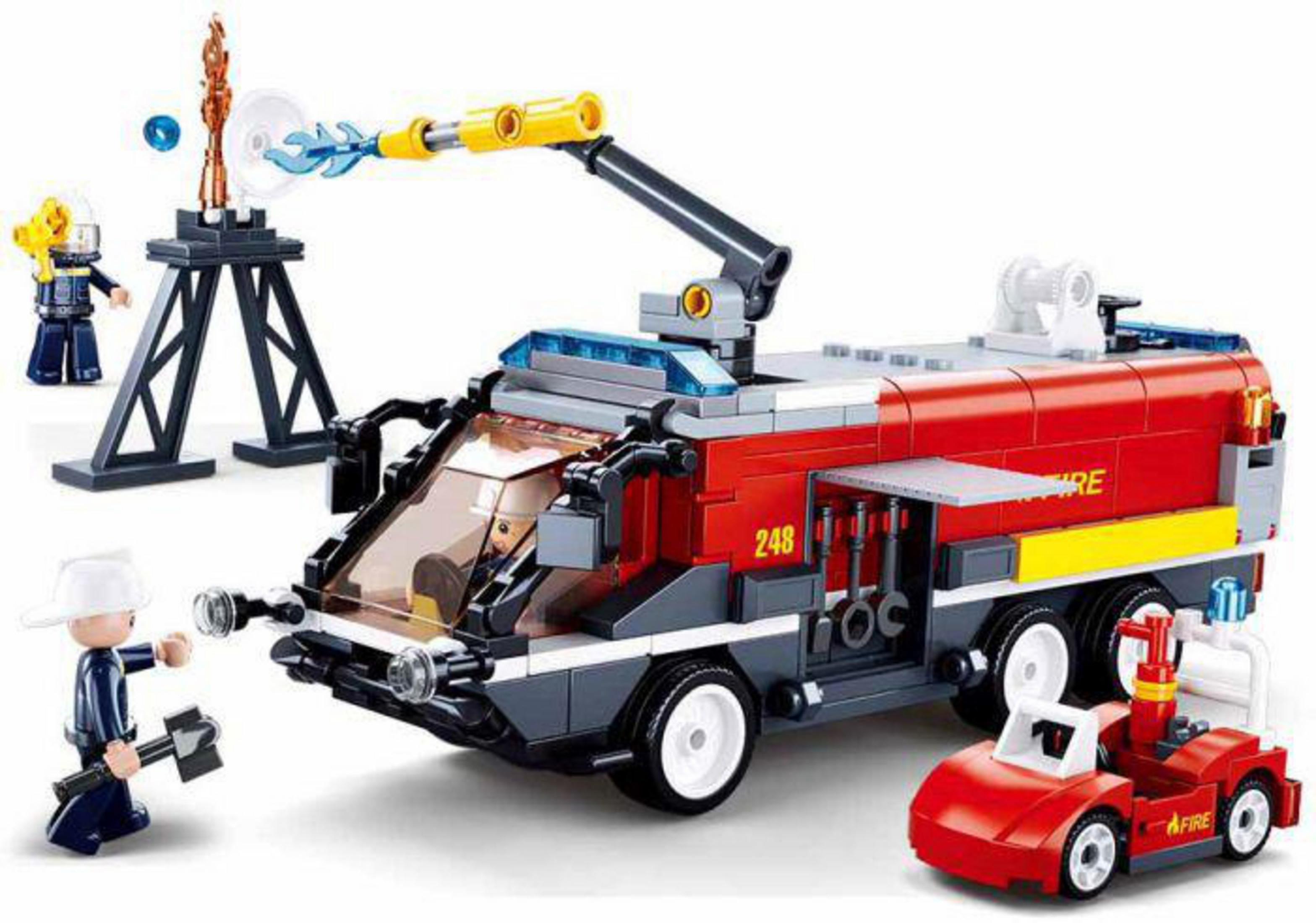 Spielzeug-Feuerwehrwagen mit Figuren, einer Raketenwerfer und einem kleinen roten Auto.
