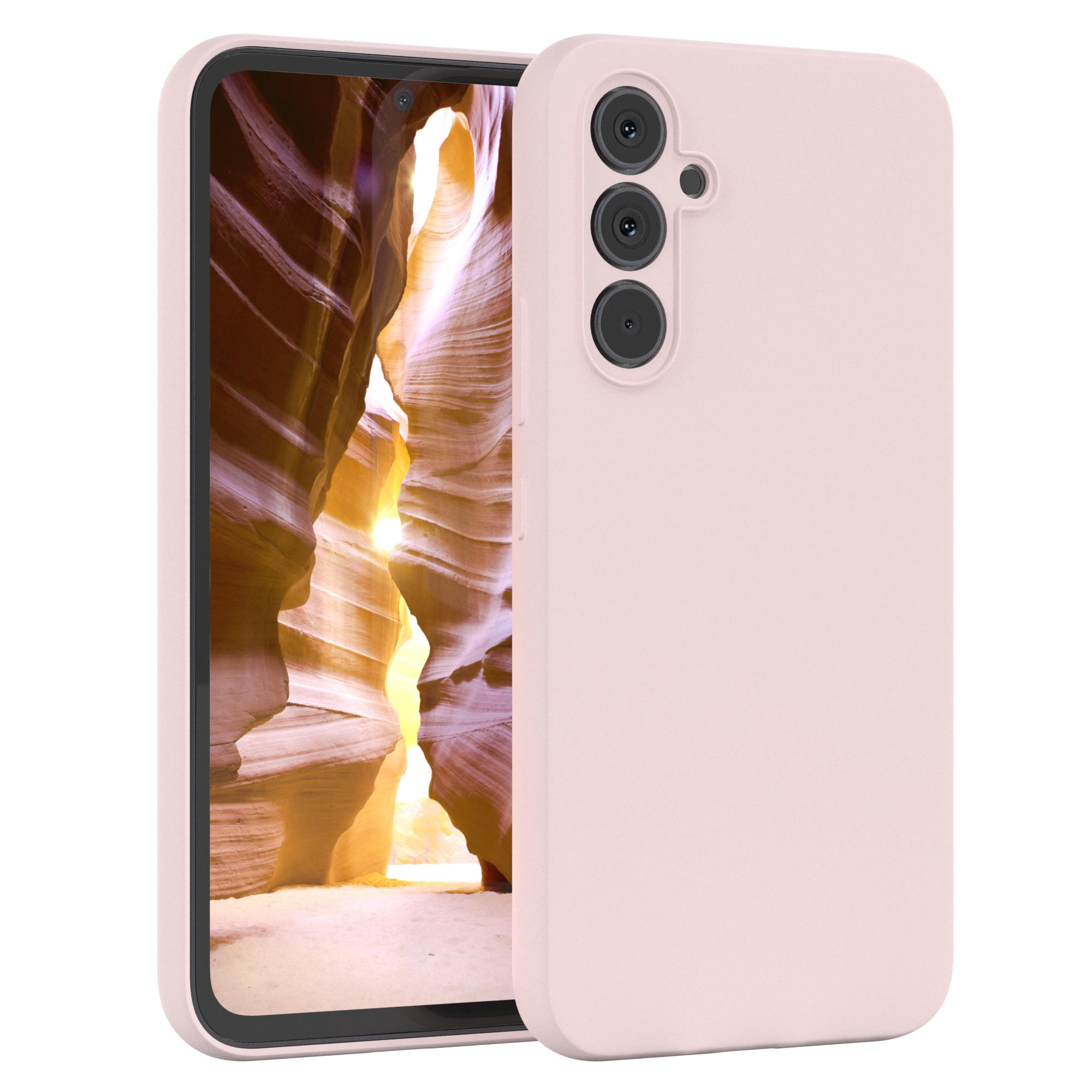 Rosa Handyhülle mit Telefon, mit Hintergrund von Canyonwänden.