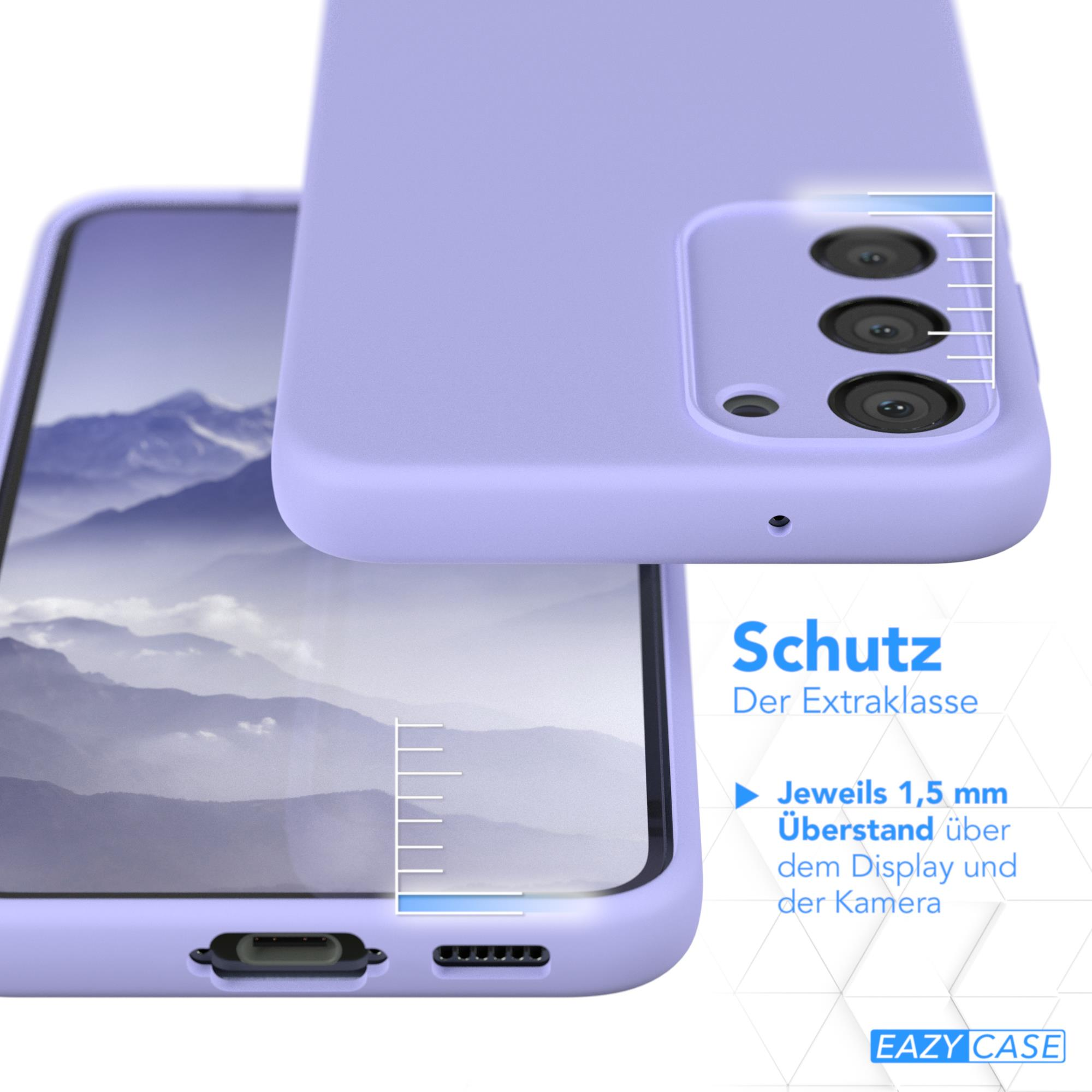 Eine hellviolette Handyhülle mit einem Telefon darin. Text: 'Schutz Der Extraklasse'.