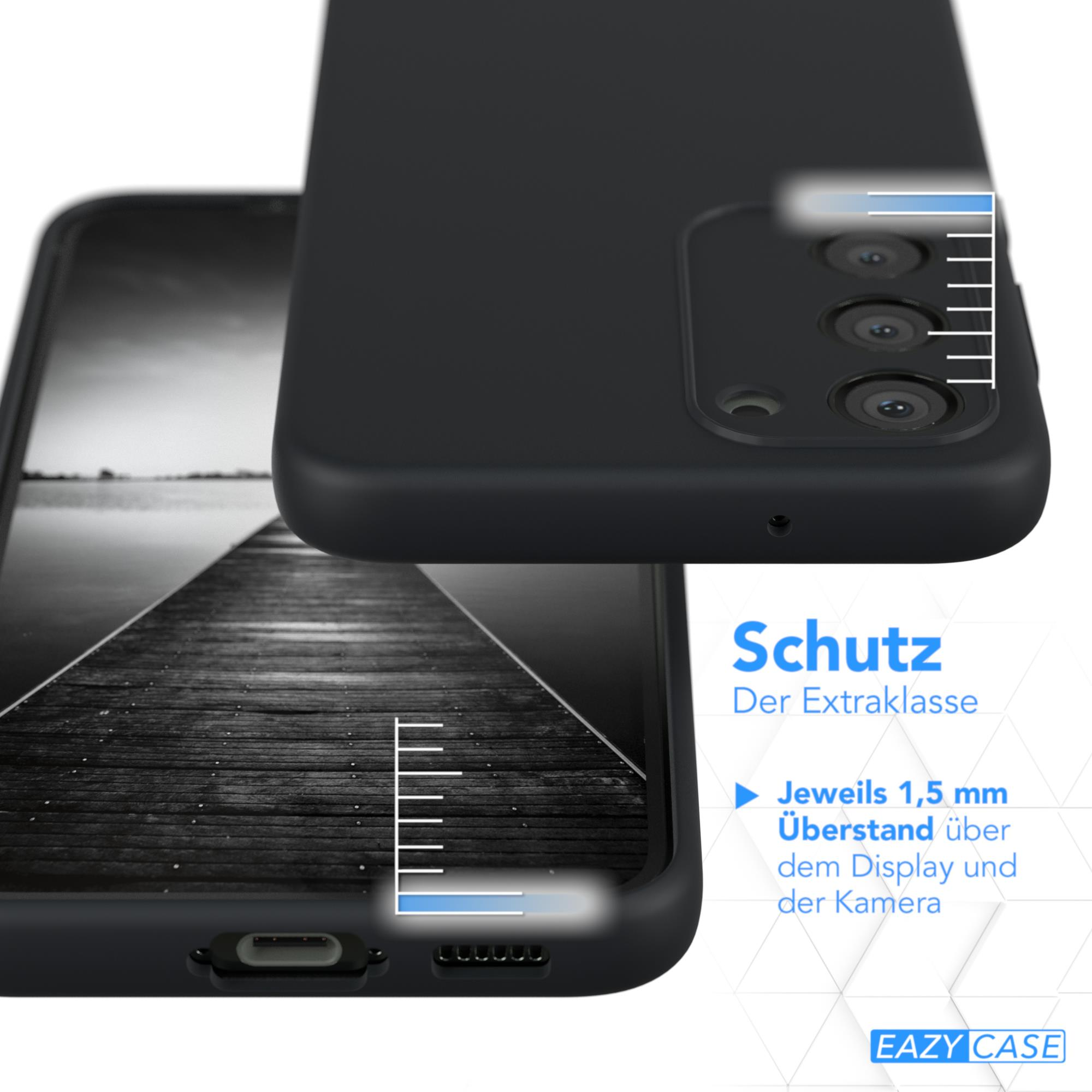 Telefon in schwarzer Hülle. Das Telefon liegt auf einer Holzoberfläche. Text in Weiß, mit Lineal und Logo.