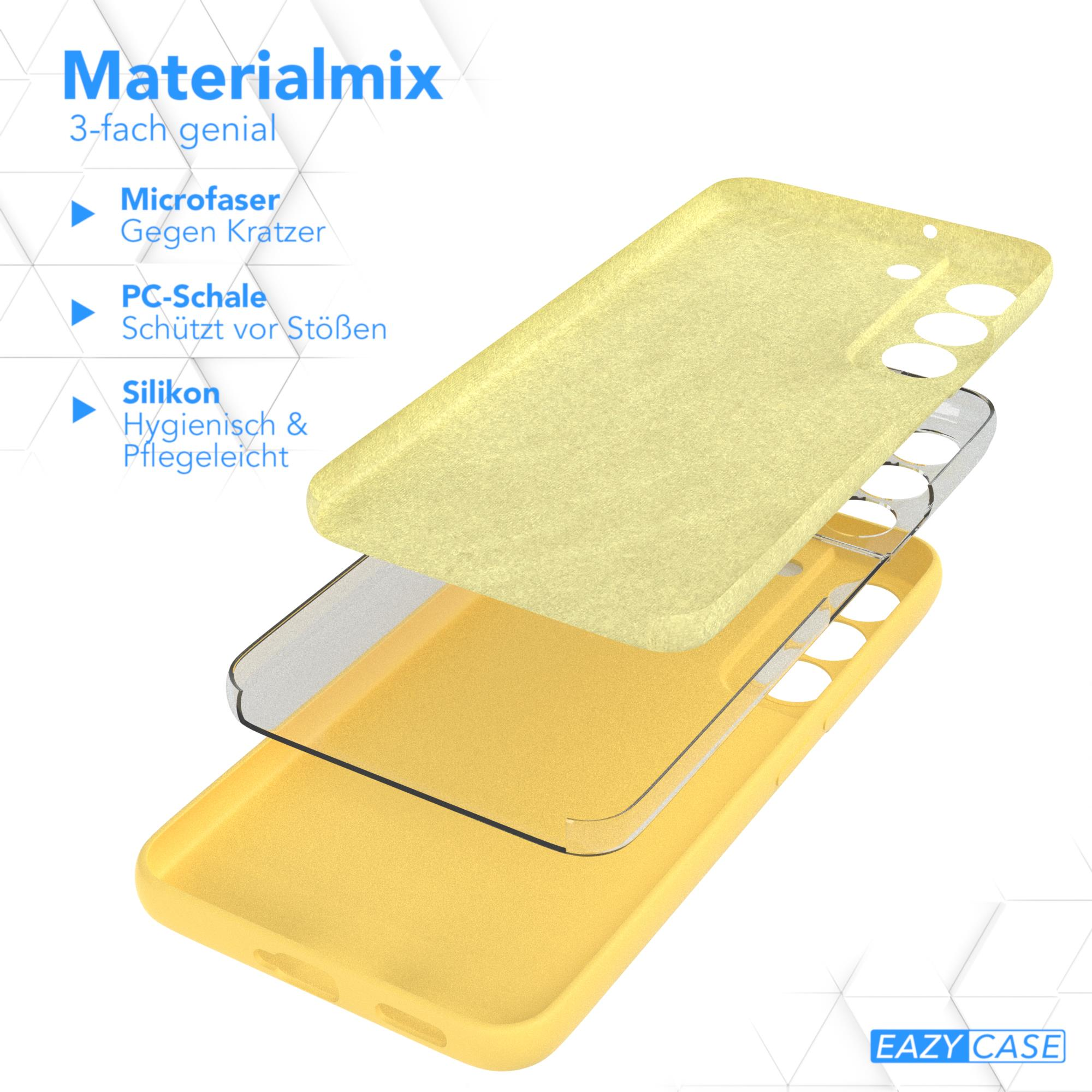 Explosionszeichnung eines Handycase mit gelben, transparenten und gelben Schichten. Text: Materialmix, 3-fach.