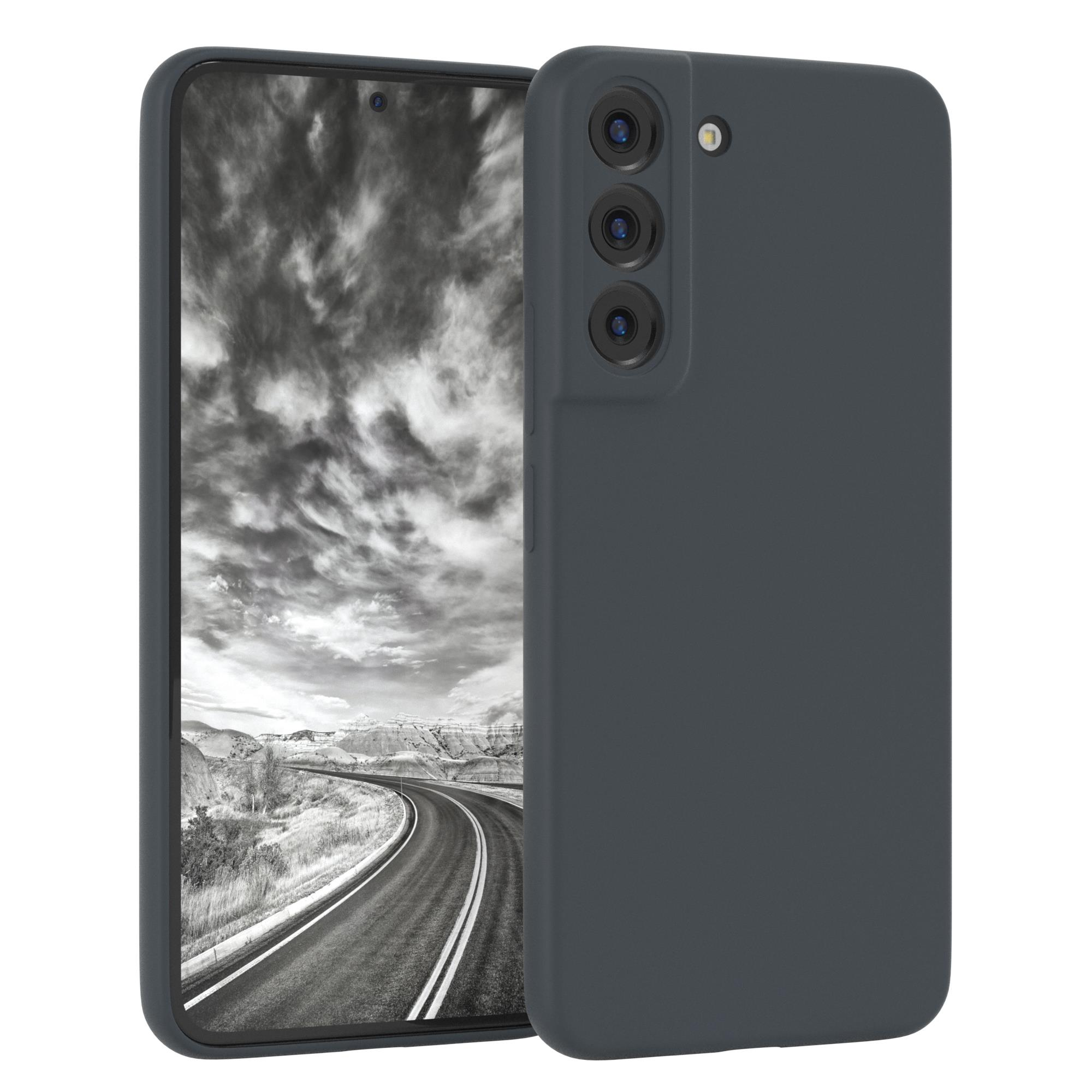 Dunkelgraues Telefon mit passender Hülle, zeigt eine Graustufenlandschaft auf dem Bildschirm.