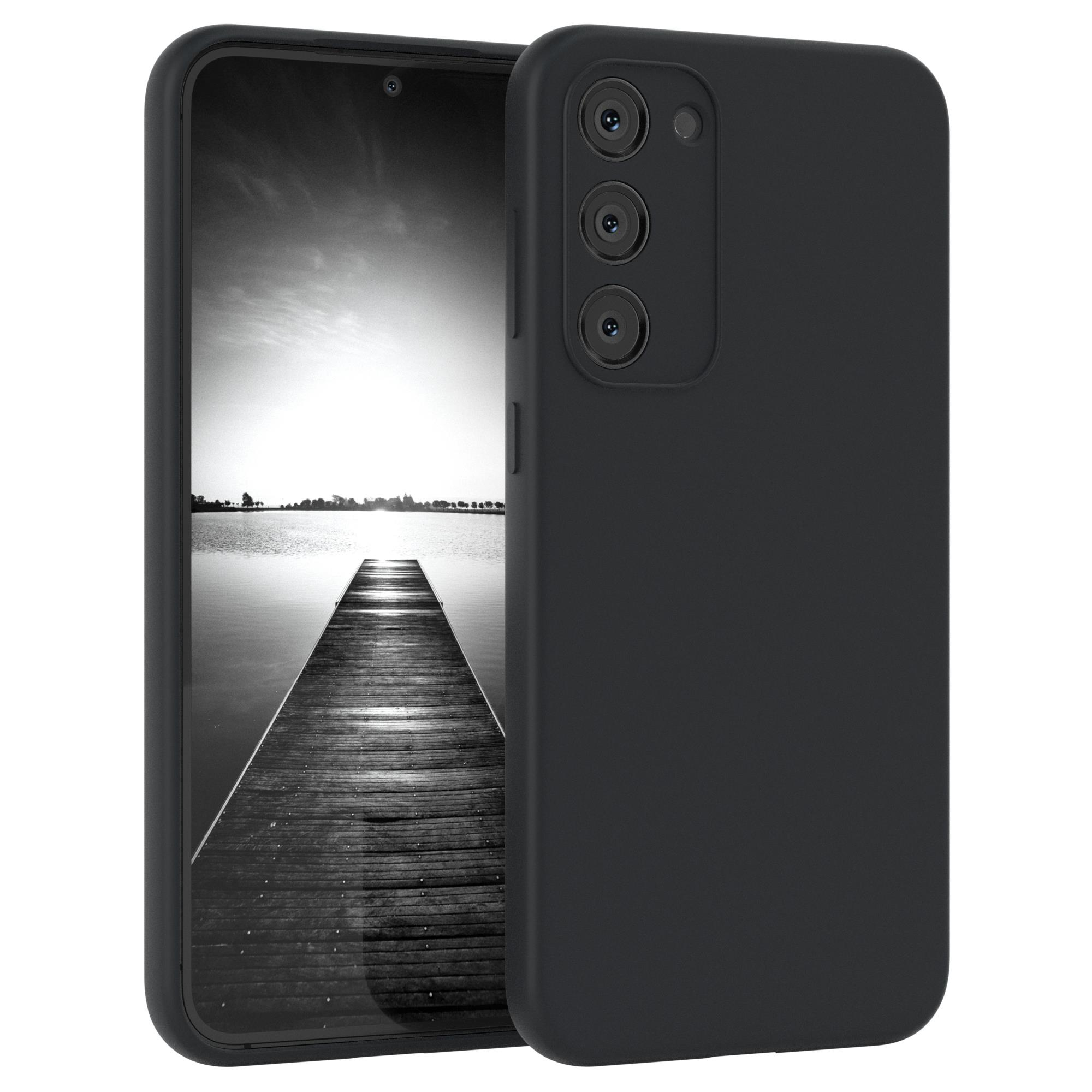 Ein schwarzes Telefon mit schwarzem Gehäuse, das die Rückseite mit einer Seeszene zeigt.