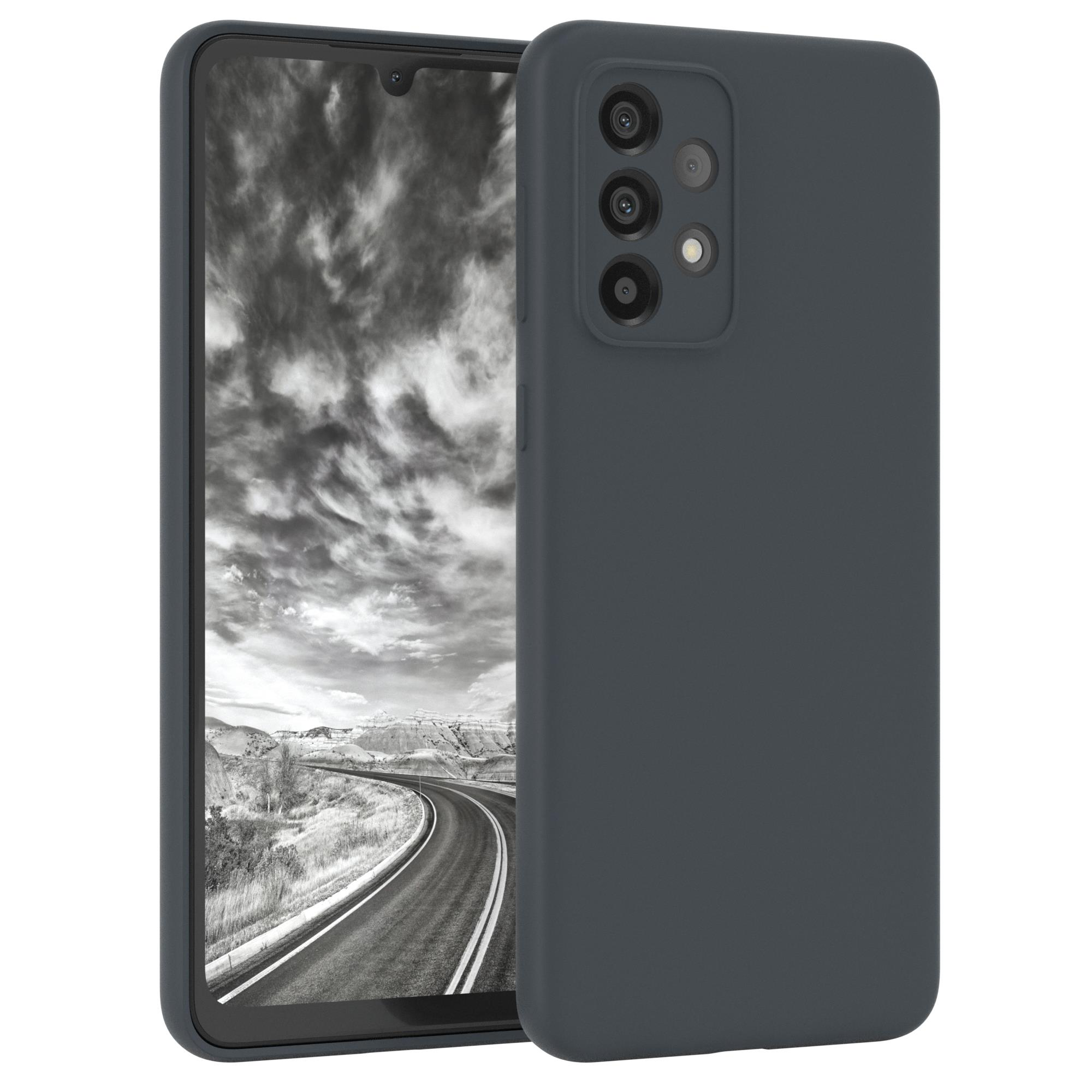 Dunkelgraue Handyhülle mit einem Telefon darin. Der Bildschirm des Telefons zeigt ein Graustufen-Landschaftsbild.