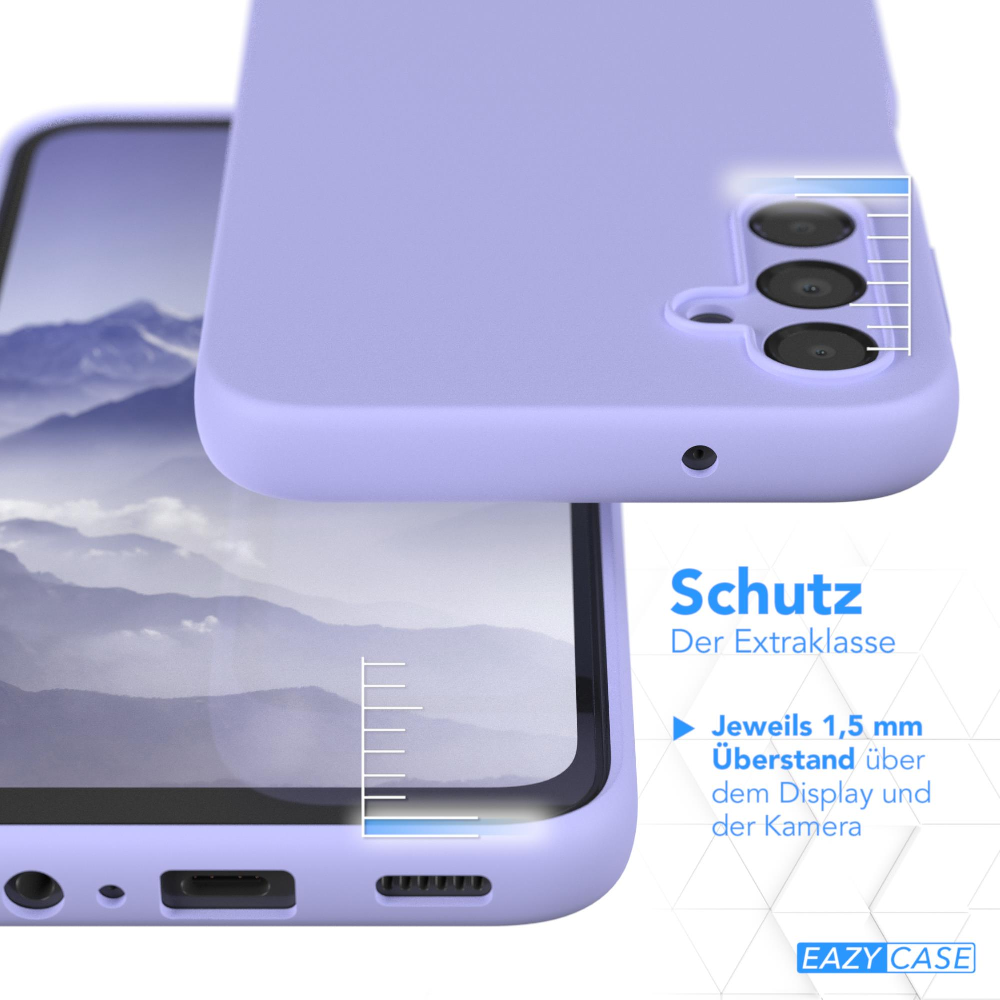Lila Handyhülle auf dem Telefon. Schutz der Kamera und des Displays.