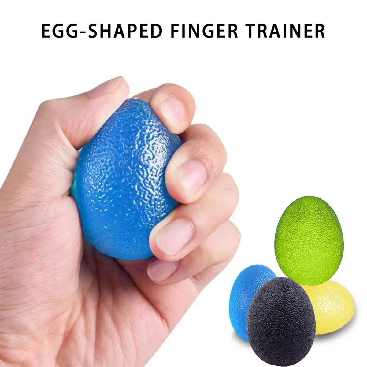 Dłoń trzymająca niebieski, jajowaty trenażer palców. W pobliżu inne kolorowe jajka.
