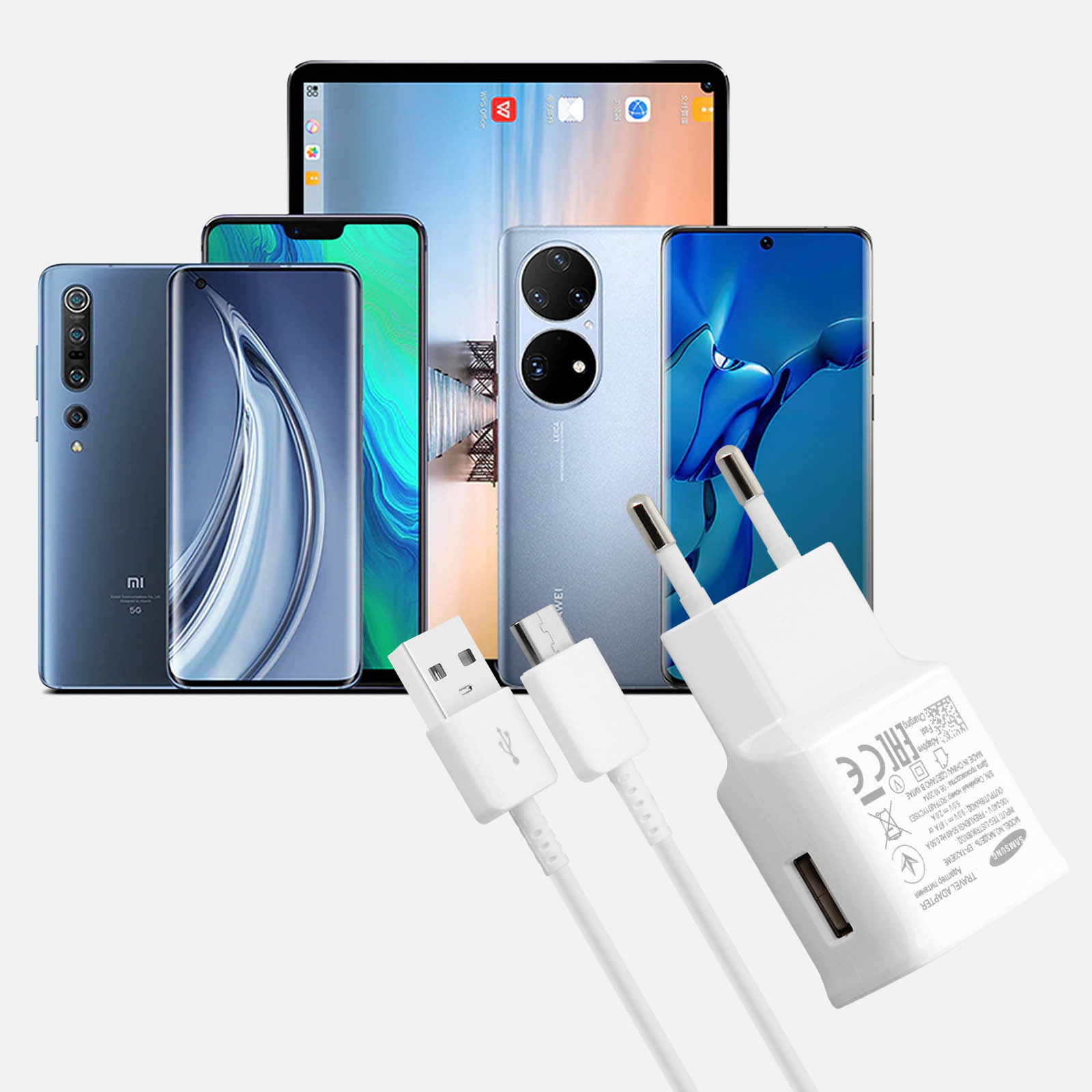 Un grupo de teléfonos y cargadores, con un cargador y cables blancos.