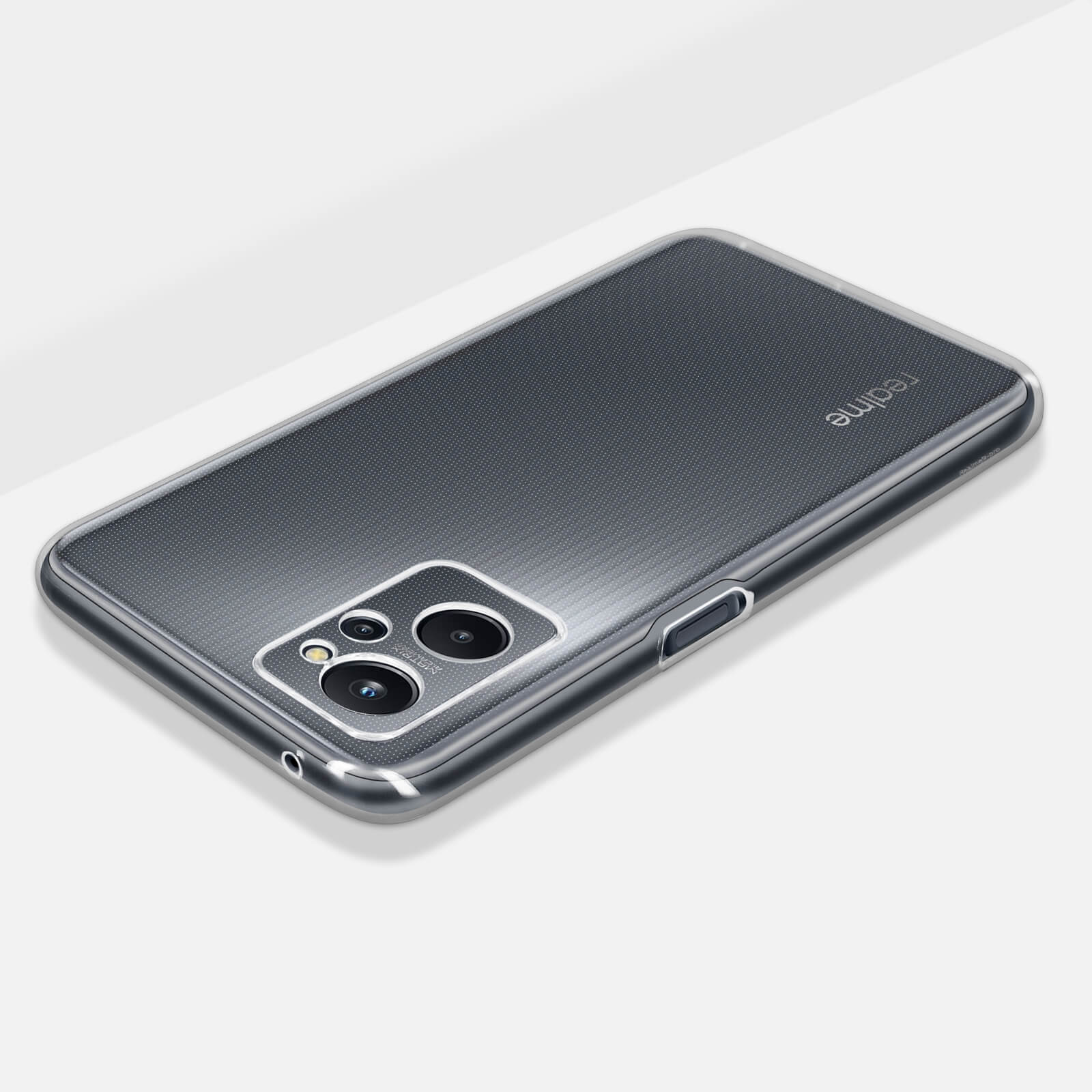 Telefono in una custodia trasparente su una superficie bianca. Il telefono ha fotocamere.