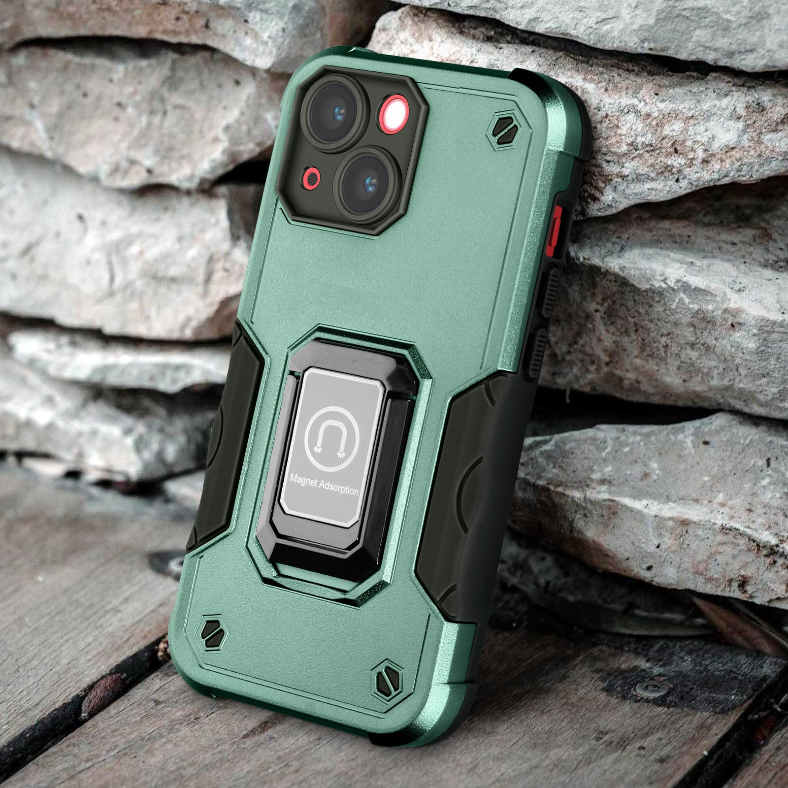 Custodia per telefono verde e nera con porta anello. Appoggiata a un muro di pietra. Obiettivi neri.