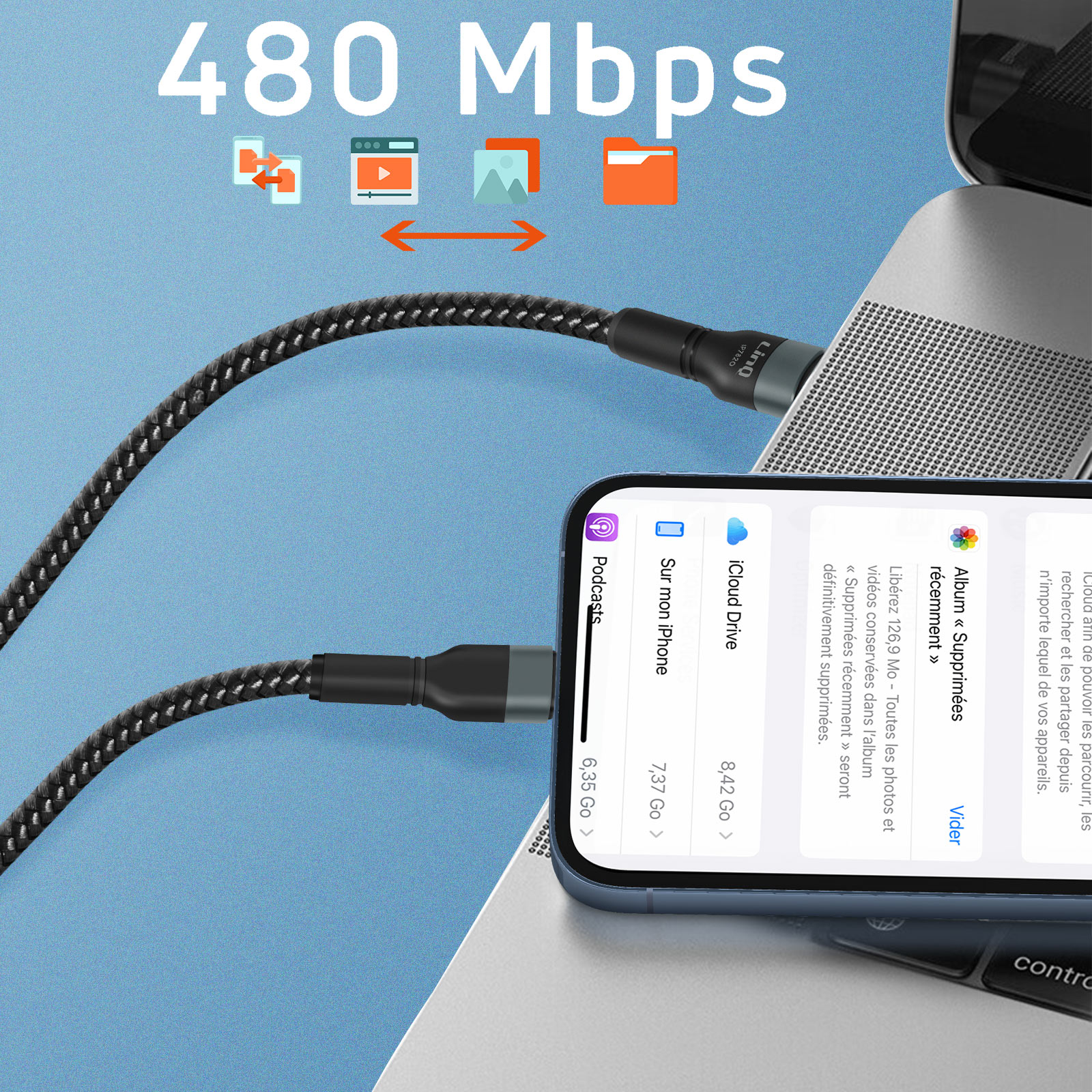 Telefon mit Kabel an Laptop und weiteres Kabel an Telefon angeschlossen. Text ist auf dem Bildschirm sichtbar.
