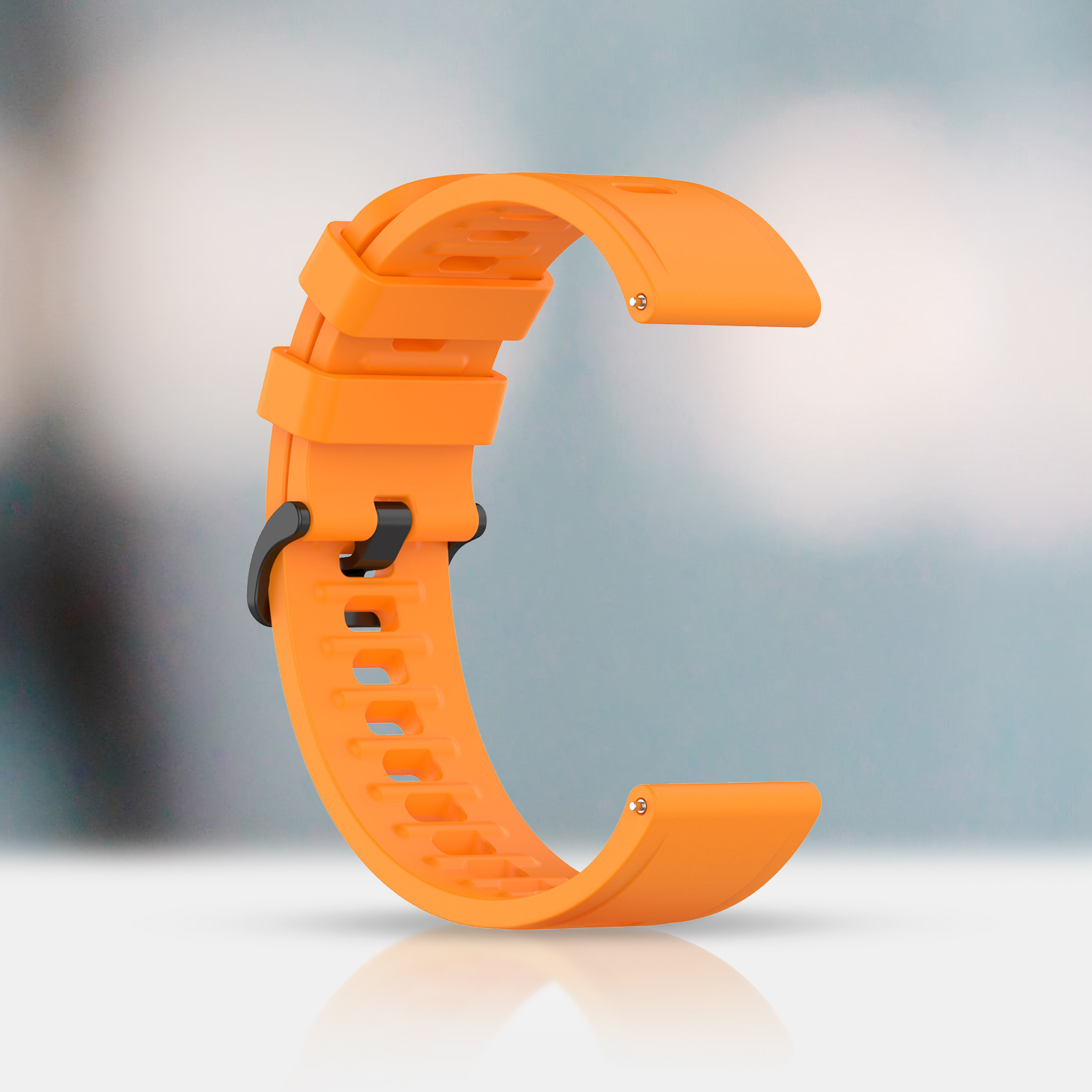 Correa de reloj naranja. La correa es curva, con una hebilla negra.