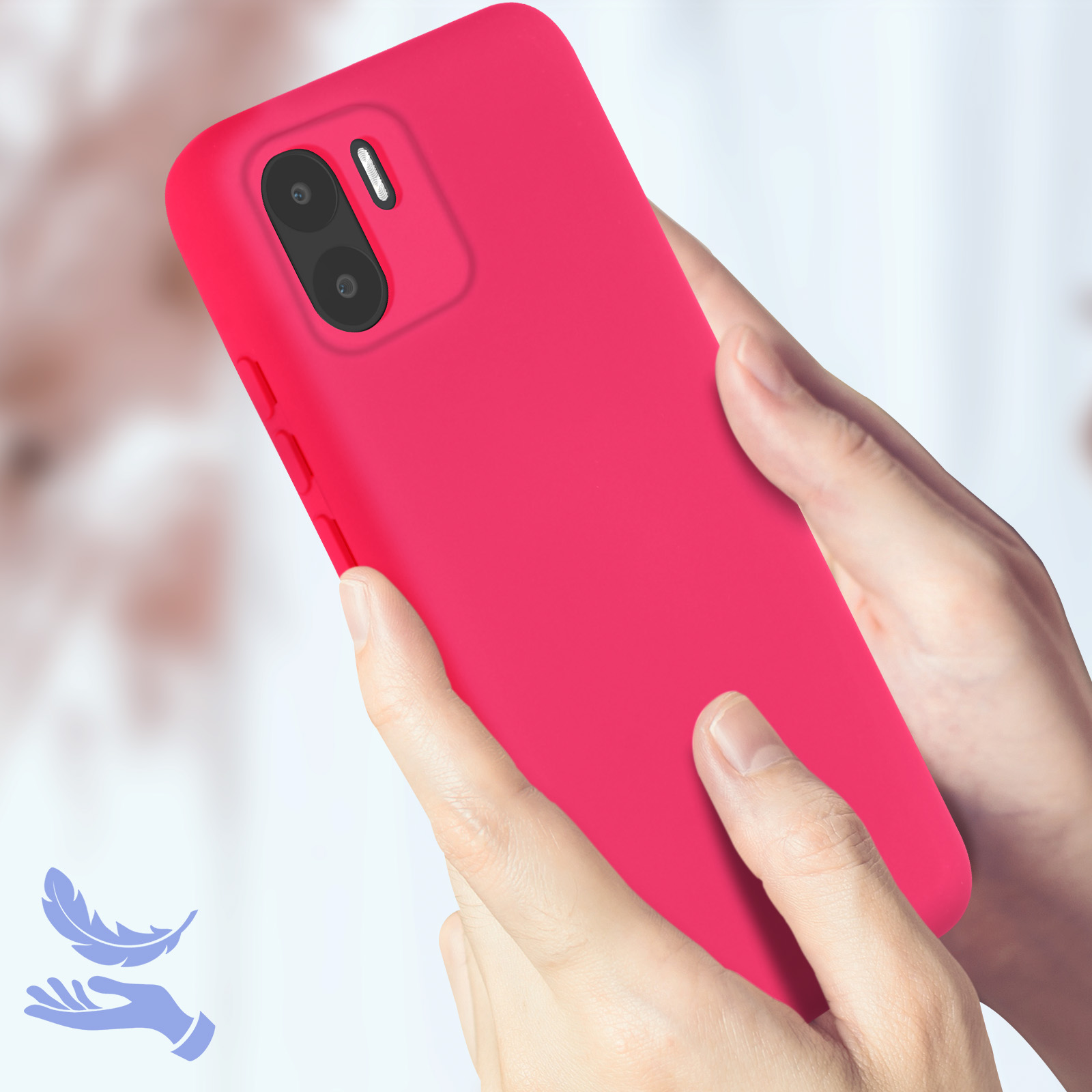 Le mani di una donna che tengono una custodia per telefono rosa con due fotocamere.