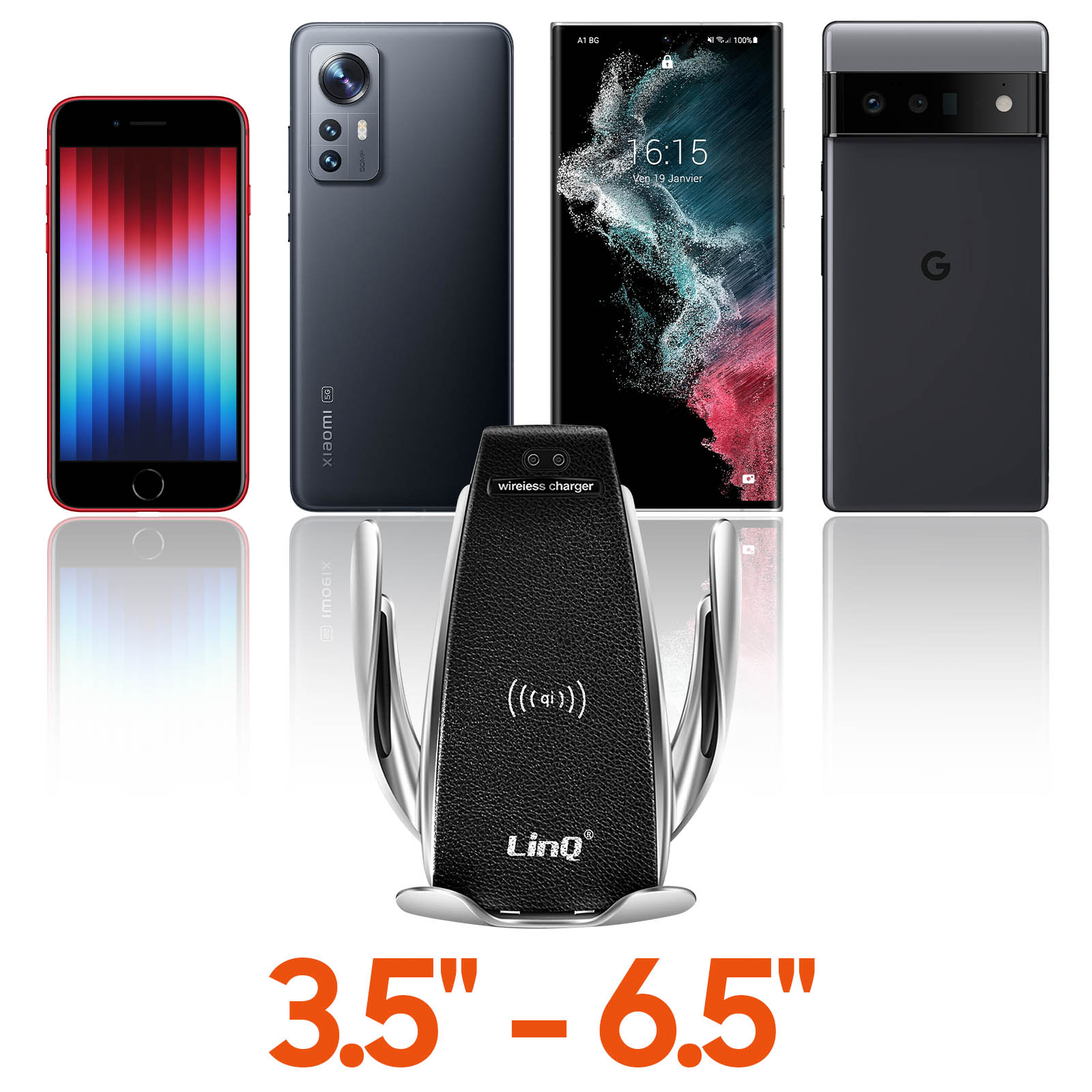 Cuatro teléfonos inteligentes y un cargador inalámbrico sobre una superficie blanca. Diferentes tamaños.