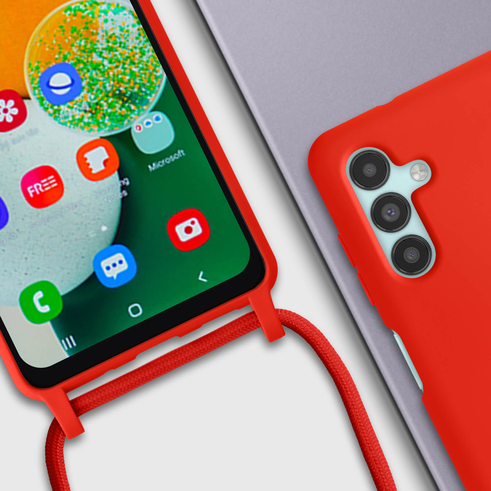 Rode telefoonhoes met een telefoon, en een telefoon aan de zijkant.