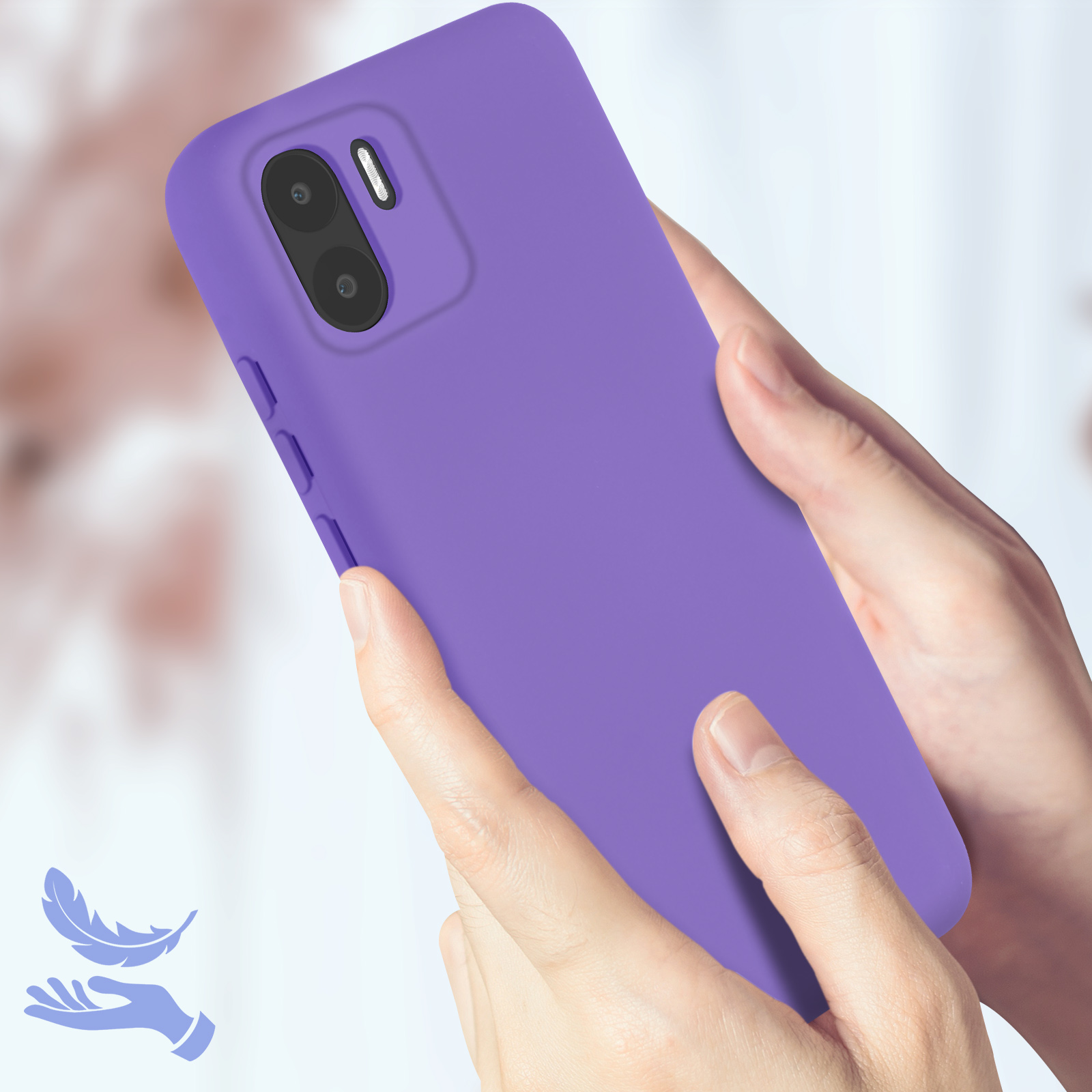 Custodia viola per telefono tenuta in mano. Obiettivo della fotocamera visibile. Icona piuma.