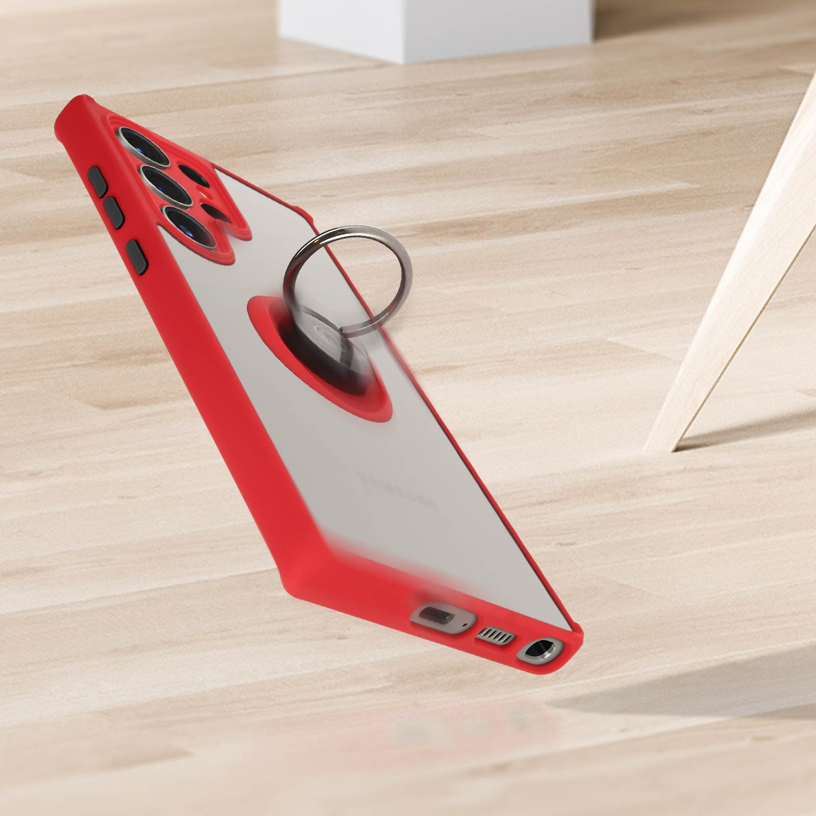 Custodia rossa per telefono con anello, telefono inclinato su superficie in legno. Sfondo bianco e legno.