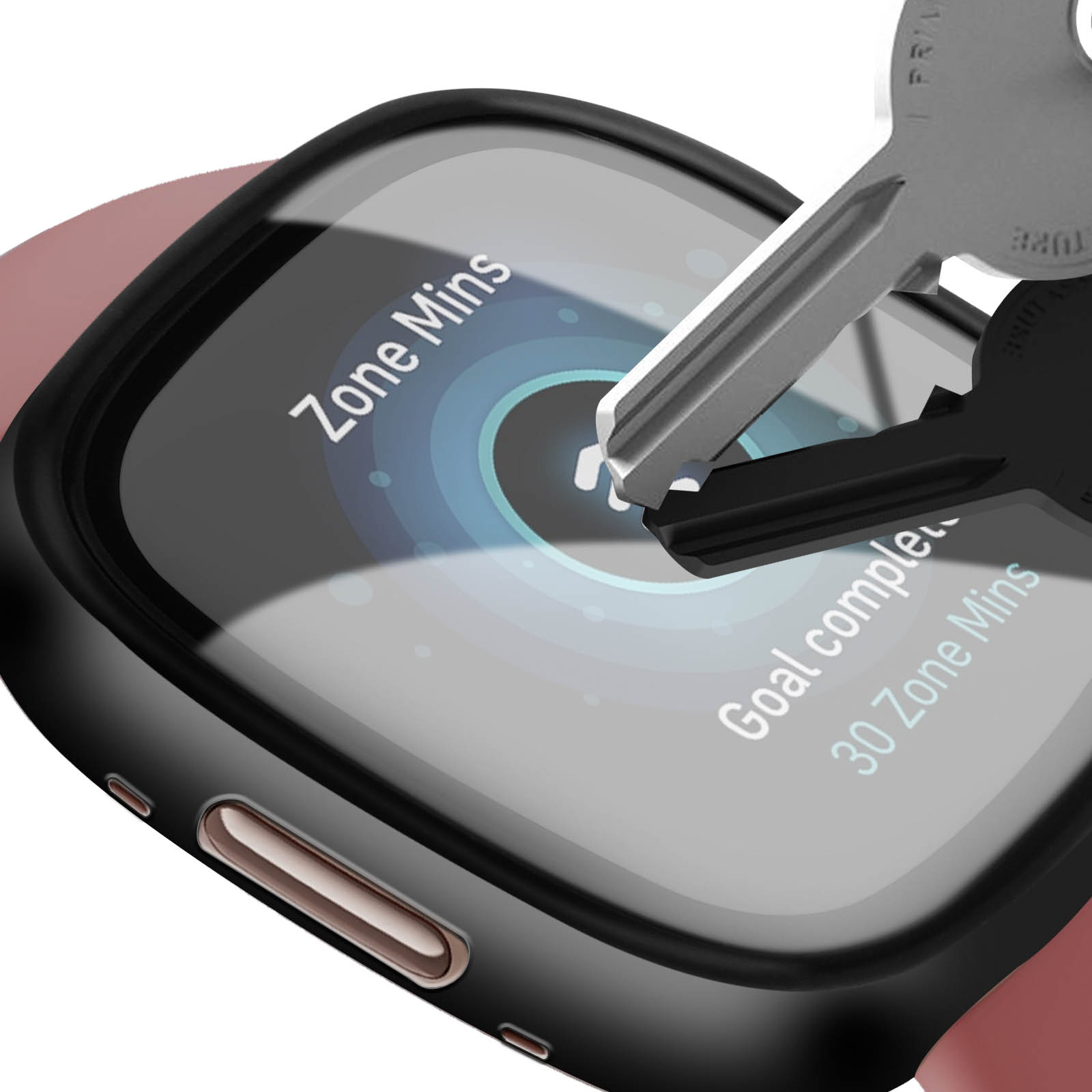 Ein Telefon in einer schwarzen Hülle, das mit Schlüsseln getestet wird. Ein Bildschirm zeigt Fitness-Metriken.