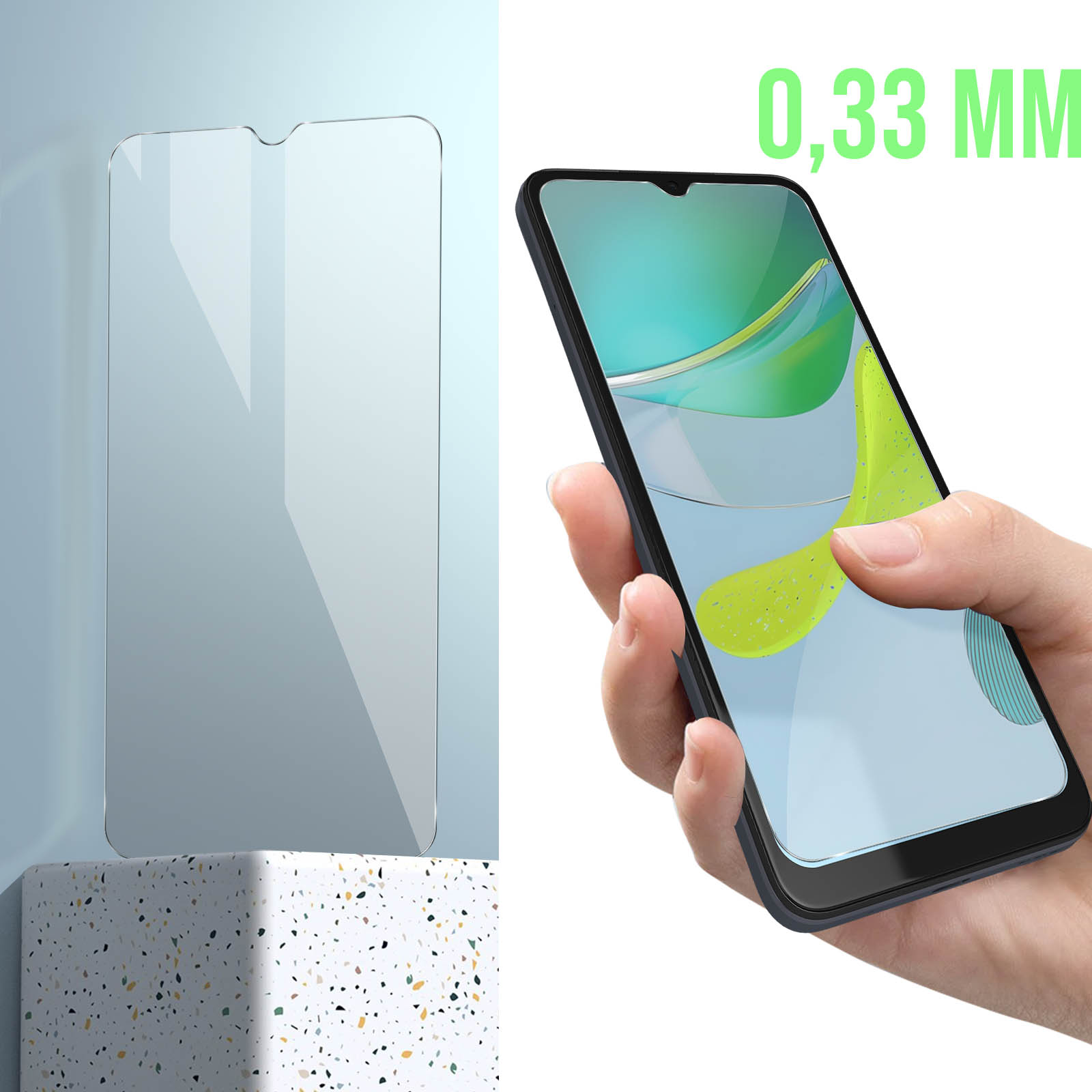 Un téléphone tenu par une main. Le téléphone est noir. Un protecteur d'écran est affiché. Le fond est un mur.