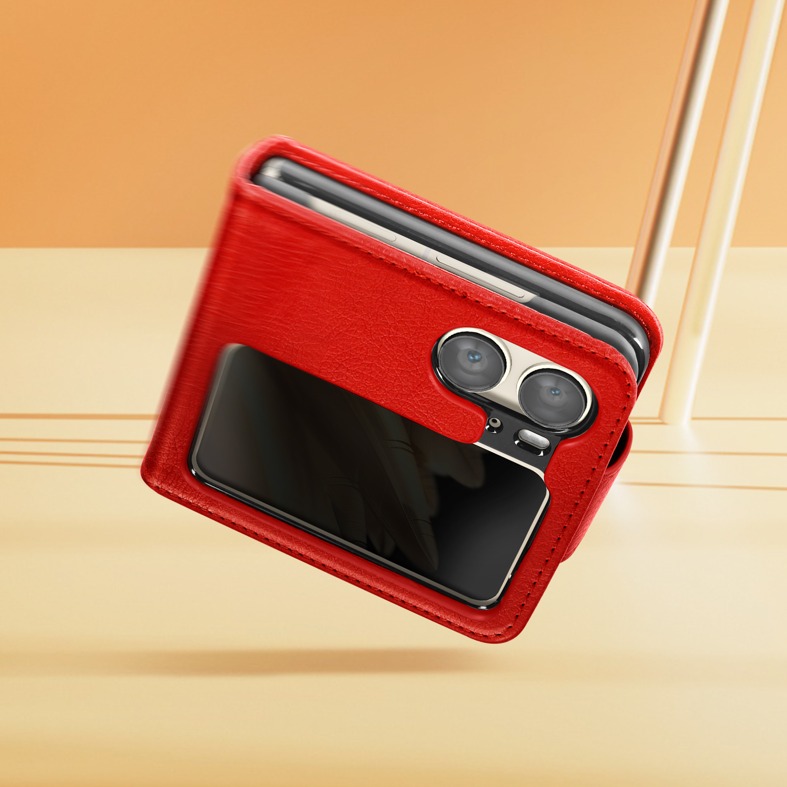 Rode telefoonhoes met zwart scherm, schuin, tegen oranje achtergrond.