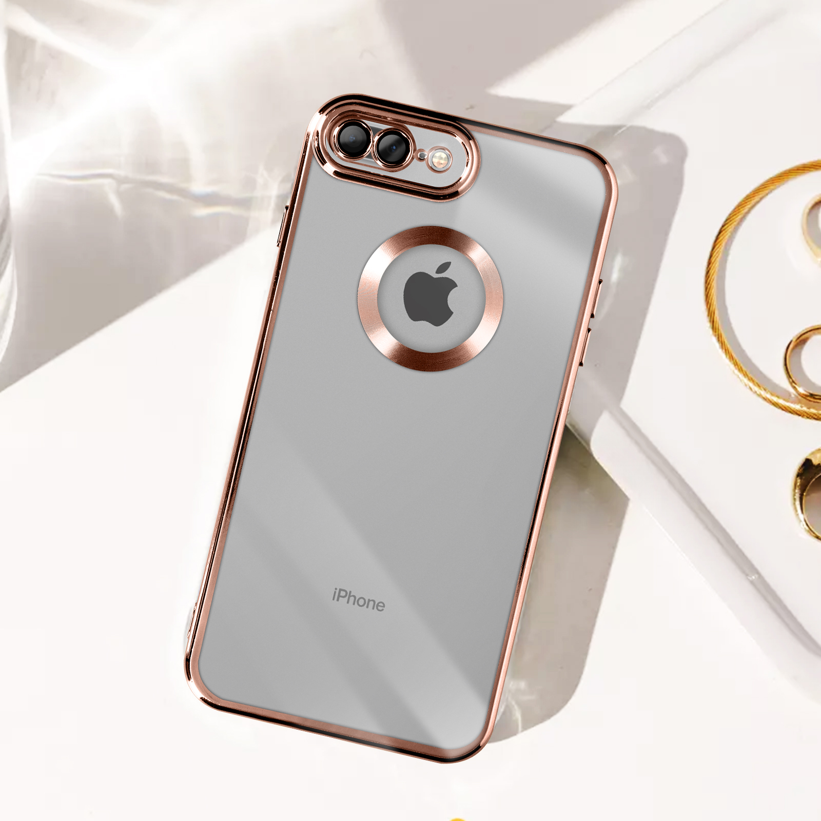Una custodia per telefono con accenti dorati. Il logo Apple è visibile al centro della custodia.