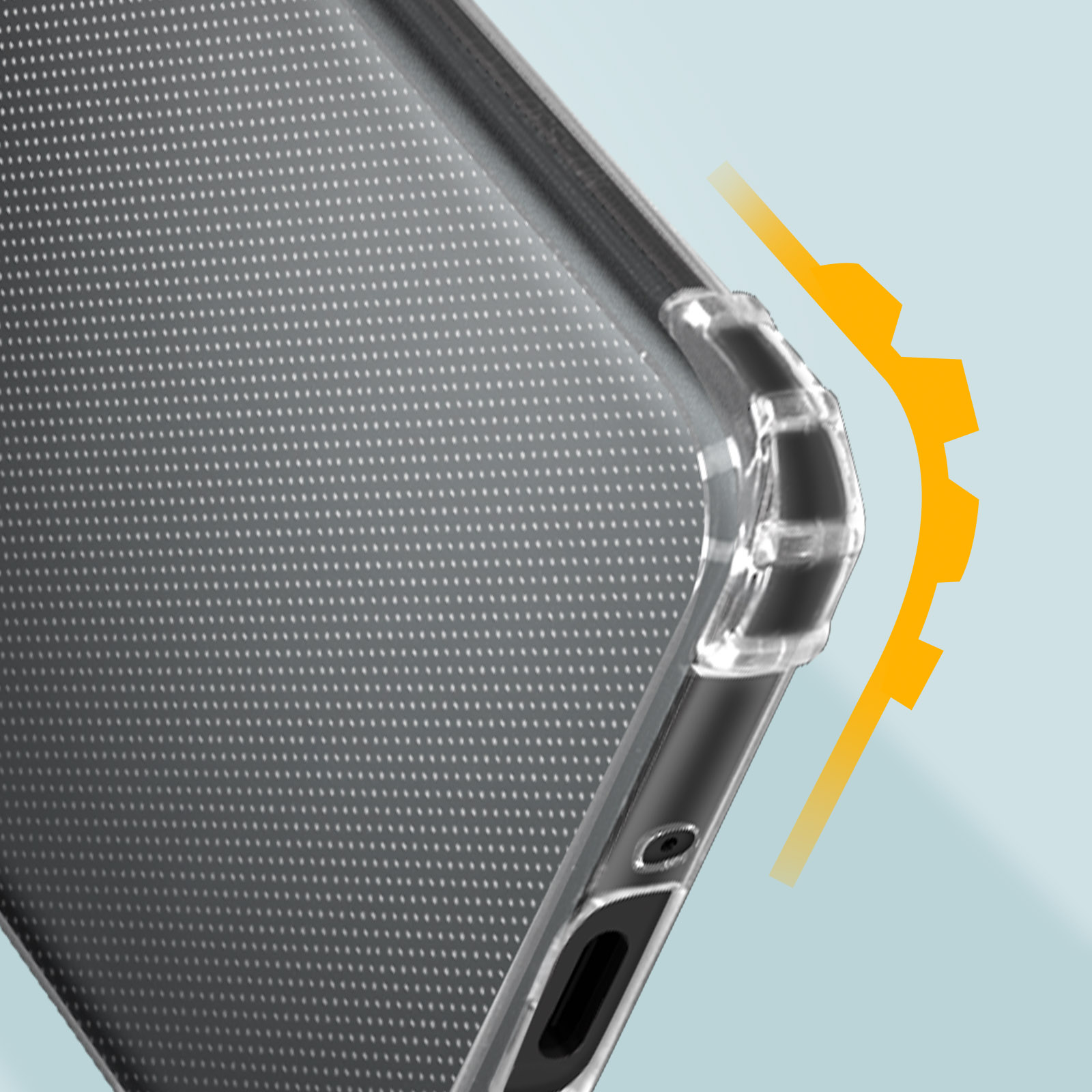 Gros plan sur le coin d'un étui de téléphone. Le coin est transparent avec un motif texturé.