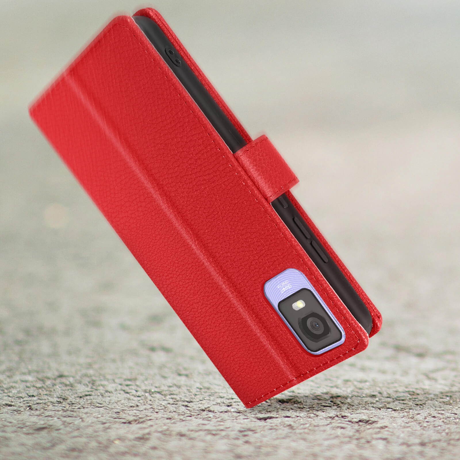 Custodia per telefono in pelle rossa aperta. Telefono con fotocamera visibile.