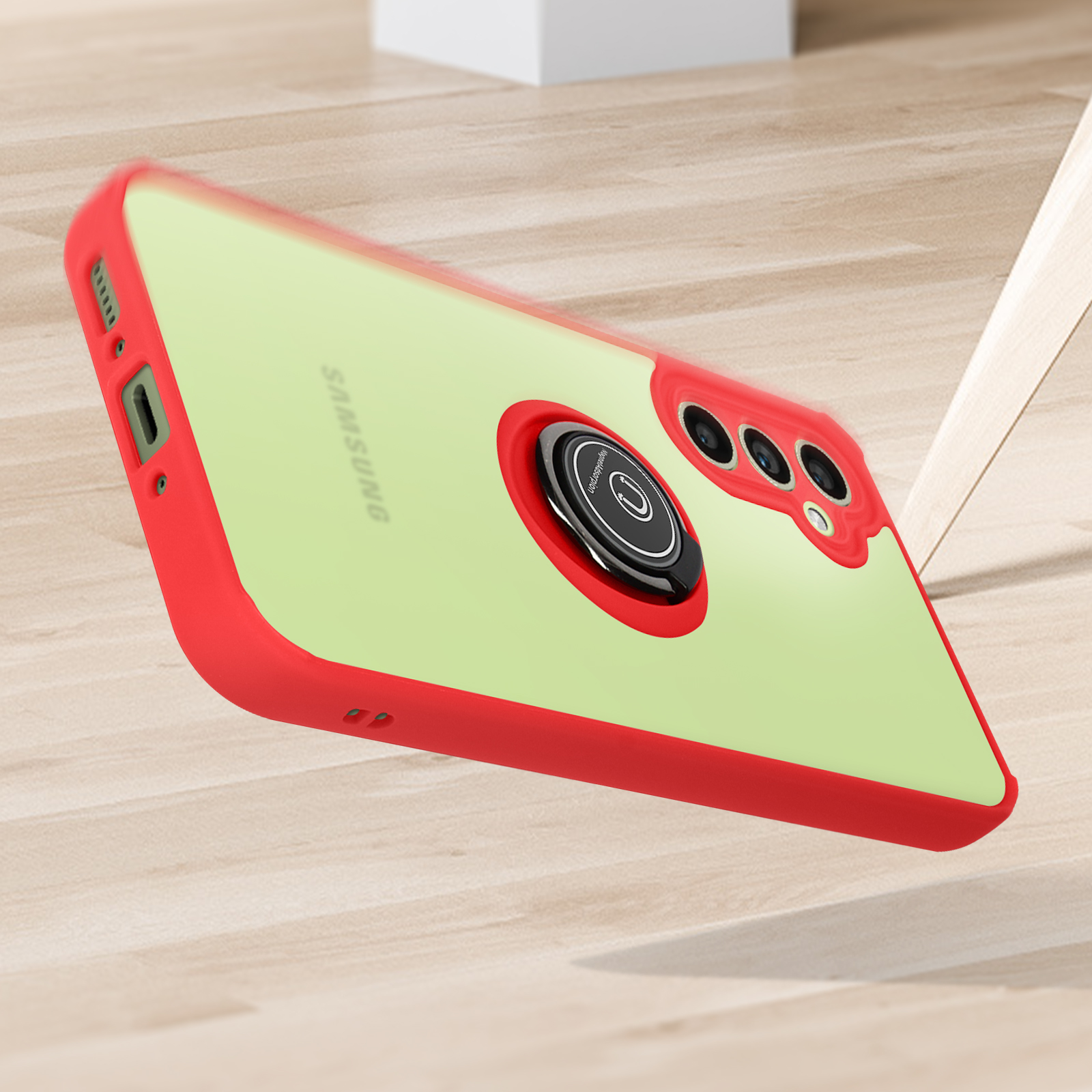 Custodia per telefono rossa e verde con anello magnetico. Logo Samsung visibile. Superficie in legno.