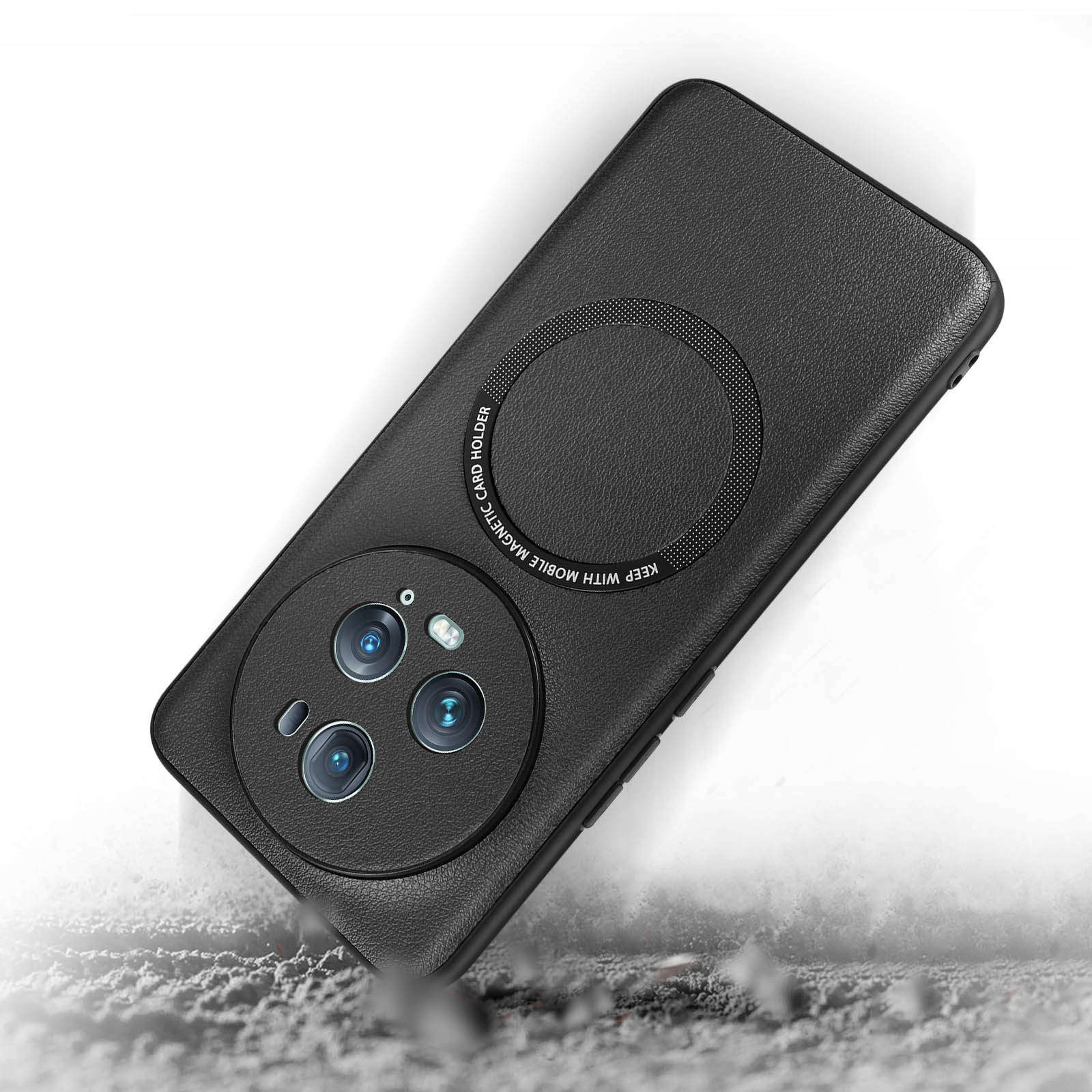 A black phone case with a magnetic card holder on the back. It is on a surface with debris.