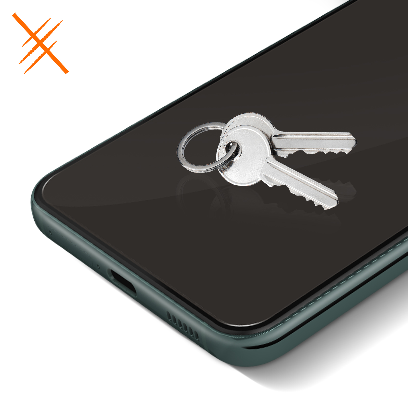Due chiavi su una protezione schermo. La protezione è su un telefono verde scuro.
