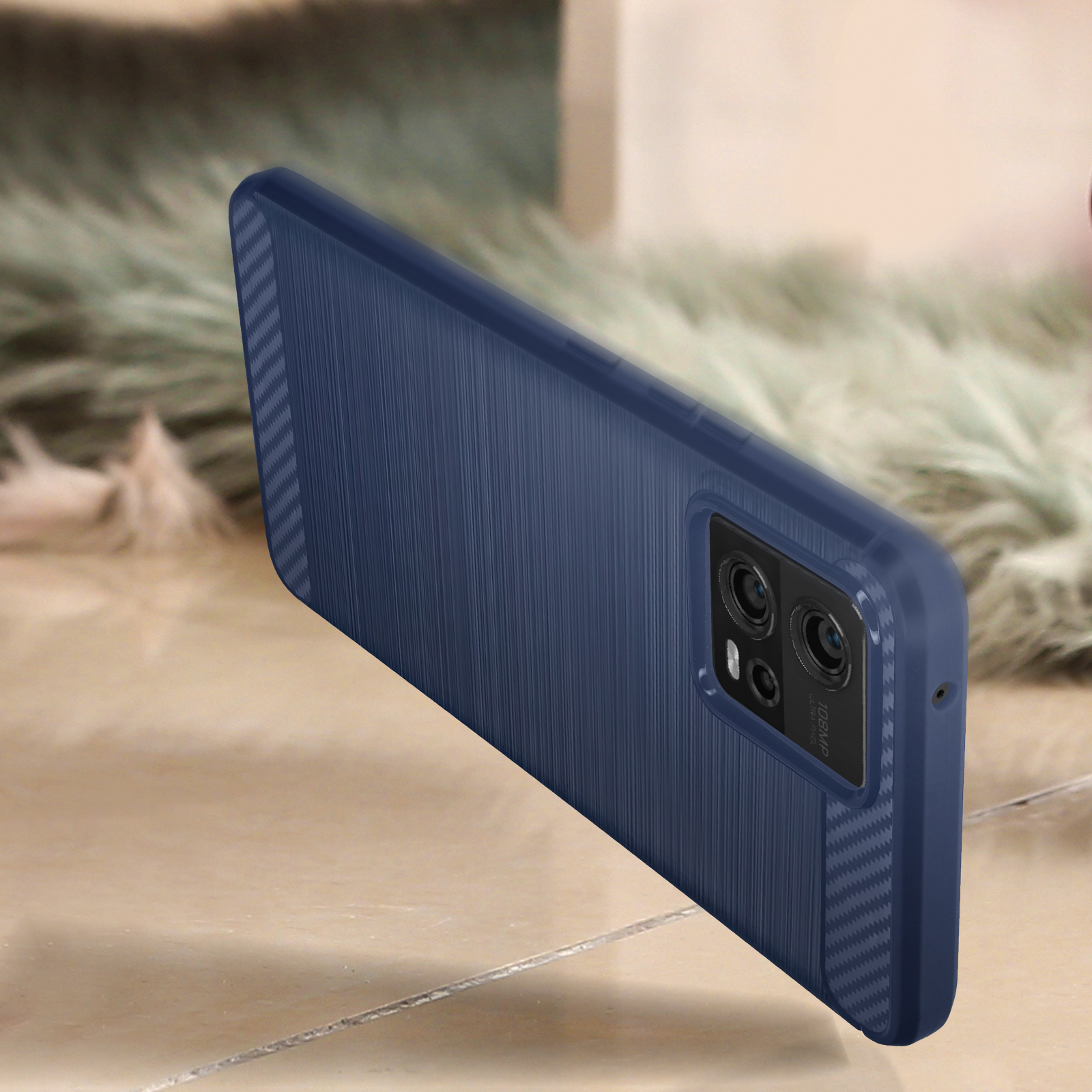 Una custodia per telefono blu con retro strutturato, con la fotocamera rivolta verso l'alto.