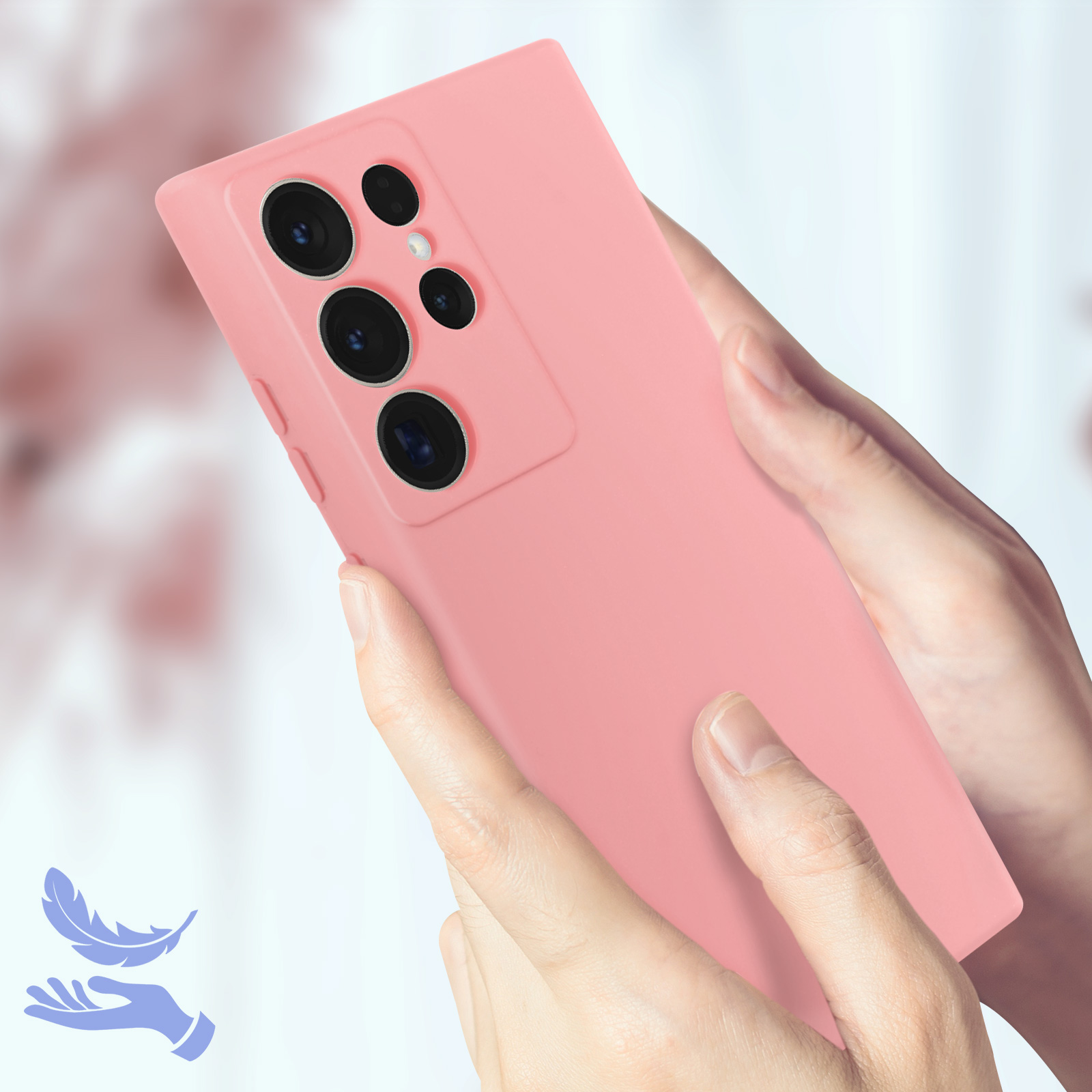Una custodia rosa per telefono tenuta in mano. La custodia ha più lenti della fotocamera.
