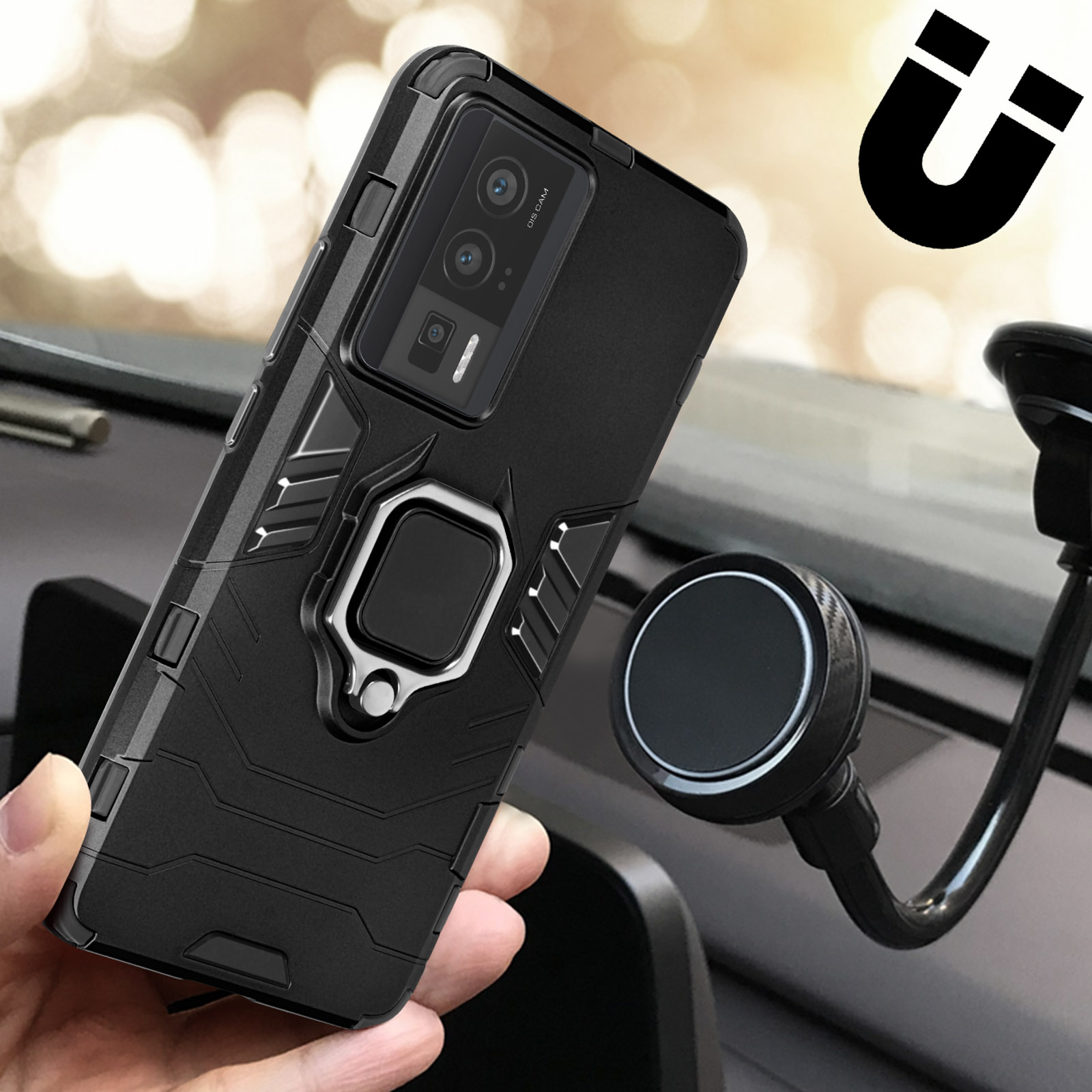 Una custodia nera per telefono con supporto ad anello è attaccata a un supporto per auto, tenuta da una mano.