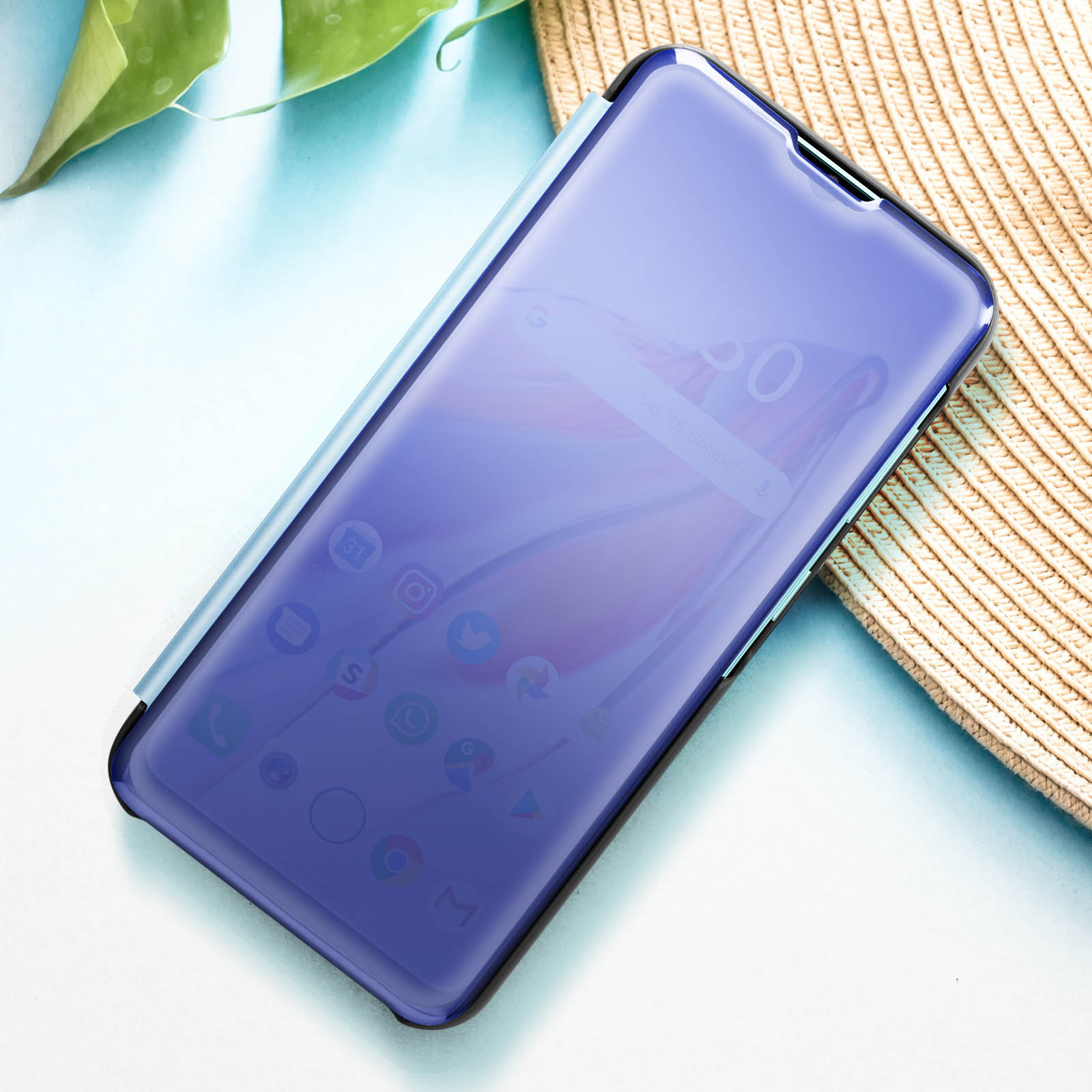 Telefono con custodia a flip. Lo schermo mostra una schermata iniziale con icone delle app.
