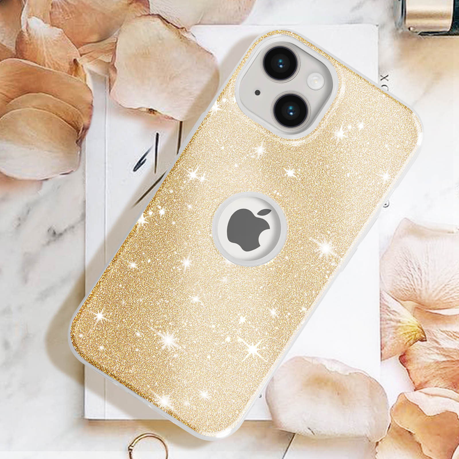 Goldene Glitzer-Handyhülle mit Apple-Logo, weißen Blütenblättern und weißer Oberfläche.