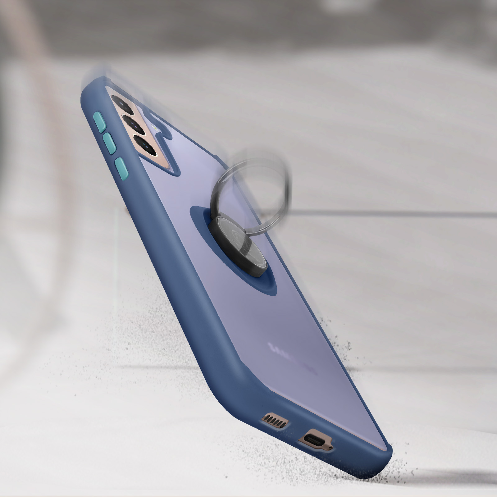 Una custodia blu con un supporto ad anello, angolata con polvere.