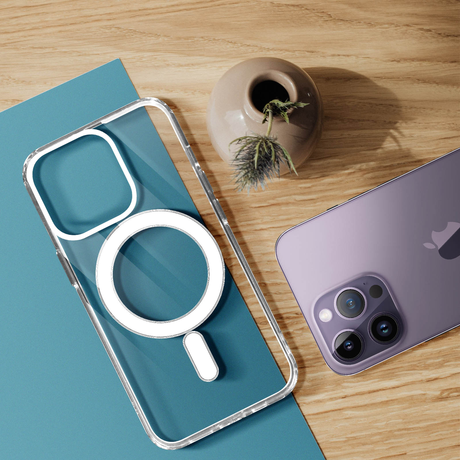 Custodia trasparente con magnete circolare e telefono. Su un tavolo di legno con fiori.