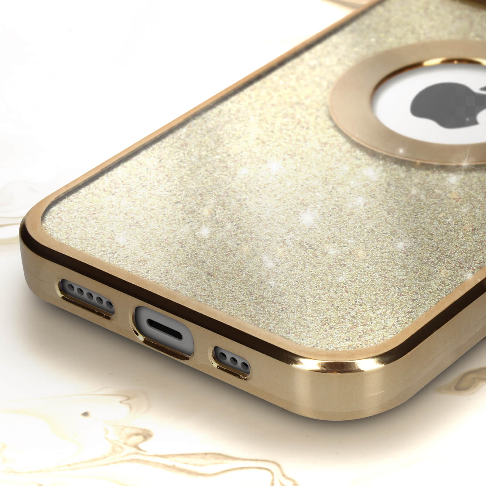 Una custodia per telefono con un design glitterato dorato con una cornice dorata, il logo Apple è visibile.