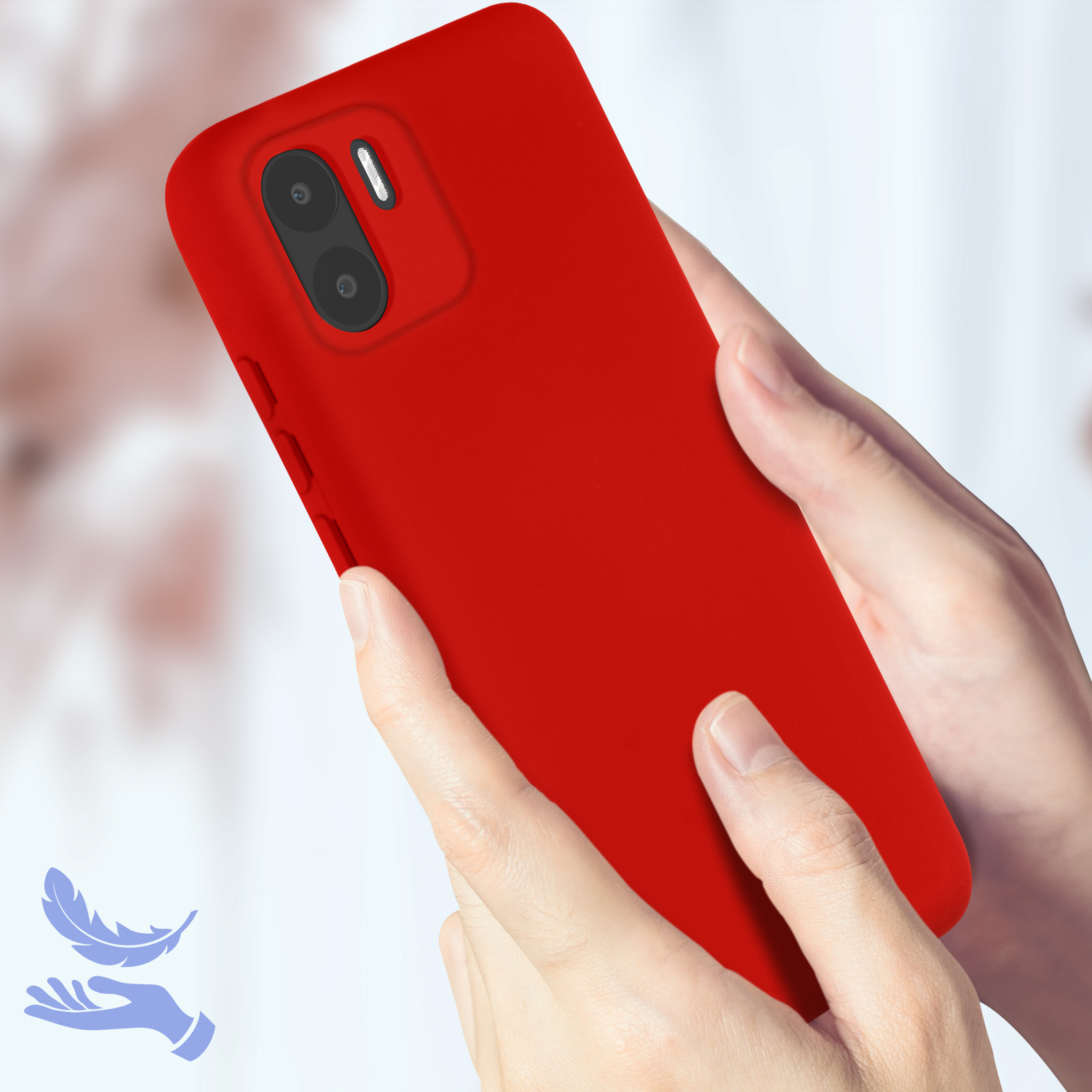 Custodia rossa per telefono tenuta in mano. La custodia ha un ritaglio per doppia fotocamera.