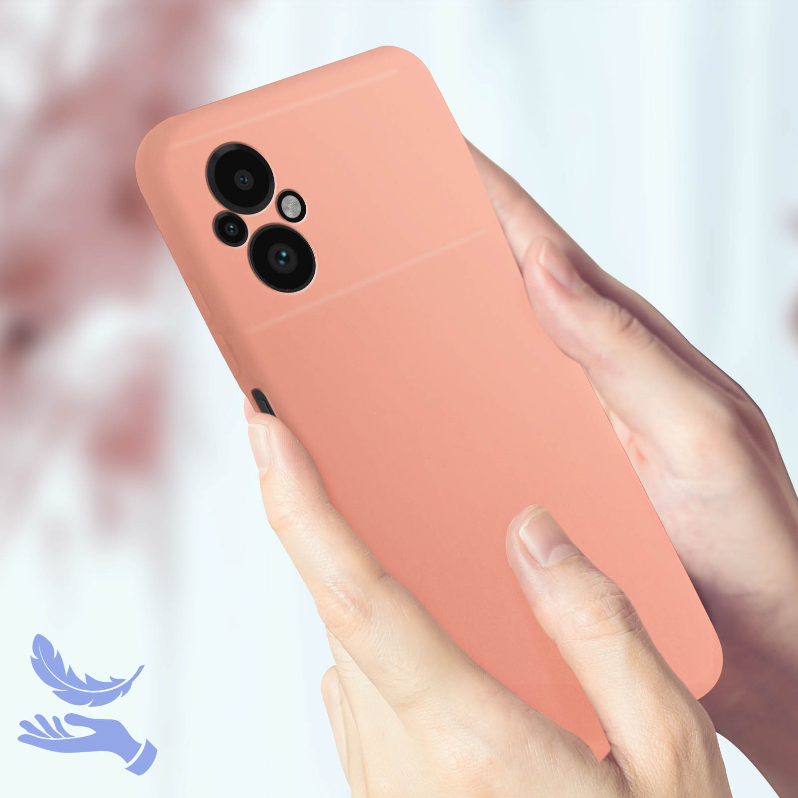 Pfirsichfarbenes Telefon in Händen, ein Feder-Symbol in der Ecke.
