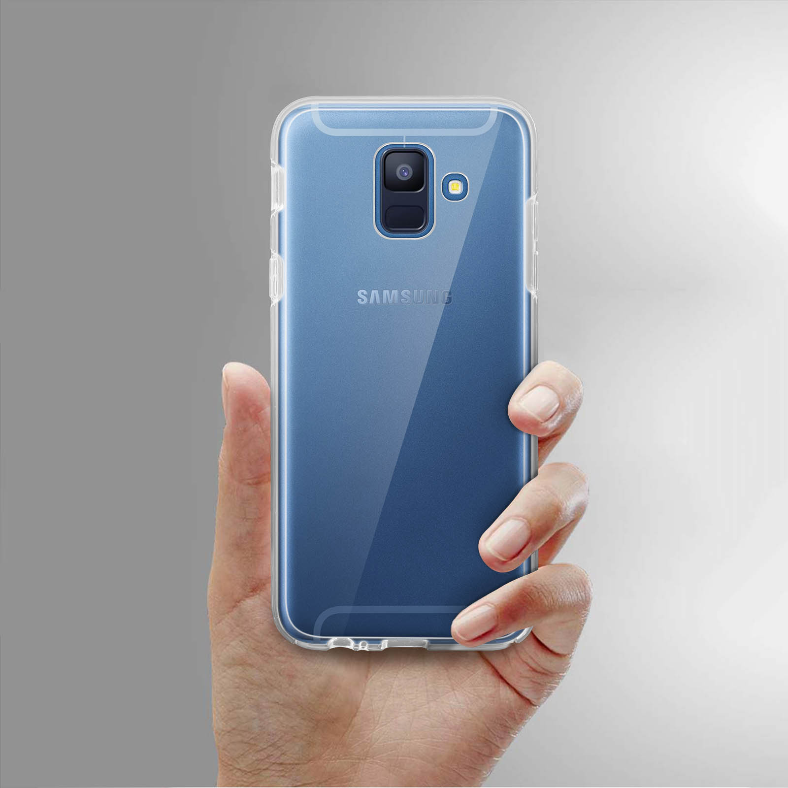 Mano che tiene una custodia trasparente con un telefono blu all'interno.