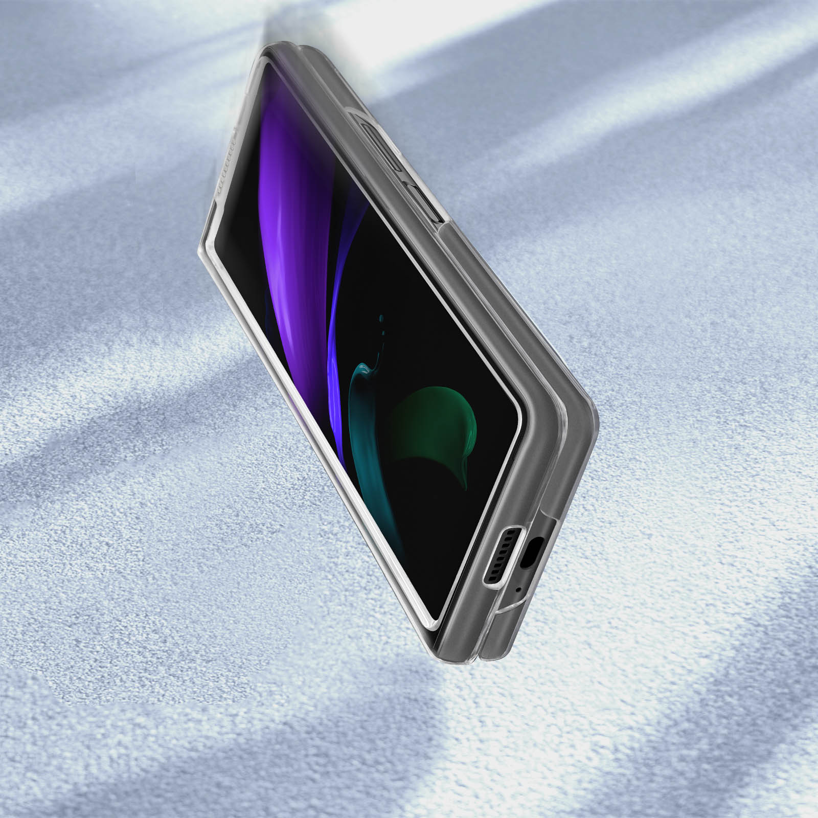 Telefono pieghevole aperto, schermo viola e verde, fluttuante.