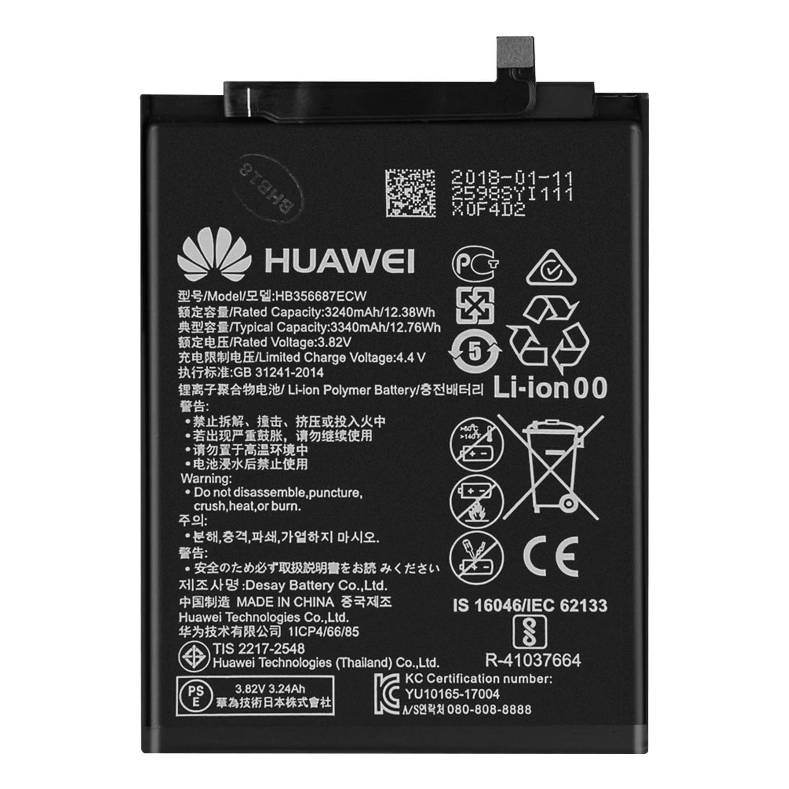 Primo piano di una batteria per telefono Huawei con etichette.